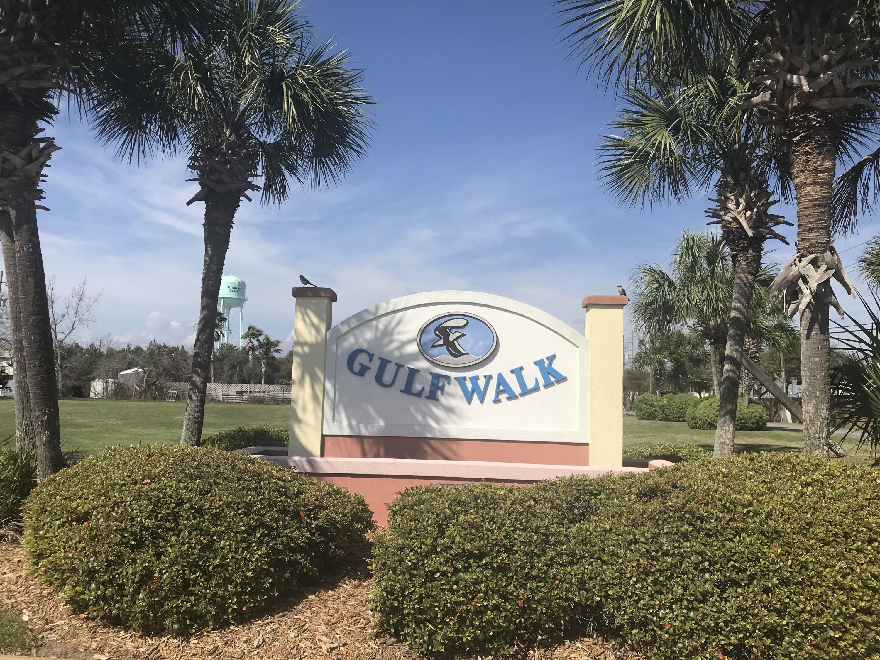 Gulf Walk is only 3 blocks from the beach, has a community pool and the property is well-maintained. This unit has all new neutral carpeting, paint and stainless steel appliances, plus a one car garage and is move-in ready. Sliding glass doors lead from the great room to your private patio with pool view. The master bedroom is light and bright with sliders to the balcony overlooking the pool and grassy common area. Washer and dryer hook-ups behind doors on the second floor, easily accessible to all three bedrooms. Pets are welcomed and there is plenty open space to walk them. This is your opportunity to own a piece of the Emerald Coast at a great price. Come see it today! Buyers to confirm all dimensions and other information important to them.