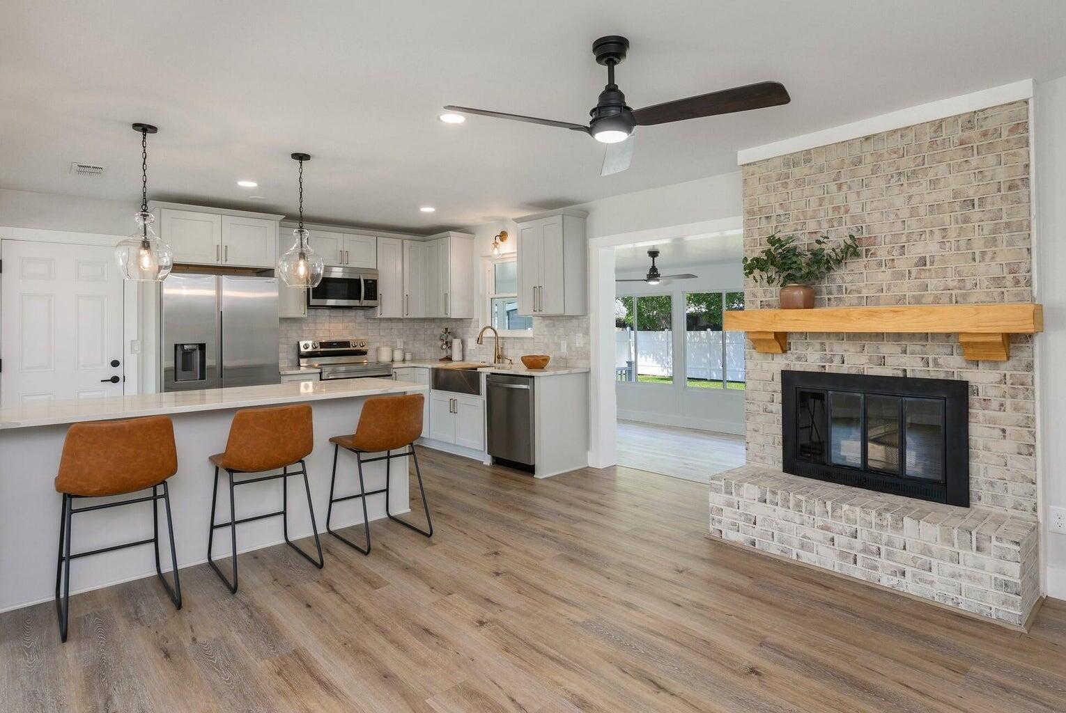 COMPLETELY RENOVATED SHALIMAR HOME NOW AVAILABLE-- AND THIS ONE IS PRICED $35,000 BELOW APPRAISED VALUE! Why, you ask? Twins are finally here and wife says--SELL IT!Welcome to 79 11th Street! This 3 BR/2 Bath **PLUS BONUS ROOM** offers 1,706 sf of OPEN-CONCEPT DESIGN that was recently gutted, renovated, improved and perfected! Details on interior renovations momentarily--- but first let's talk exterior!Not only do you have a 40-YEAR METAL ROOF (2005), Hurricane Impact Double-Hung Windows (2015), Newer HVAC (2022), EXPANDED DELUXE-SIZED DRIVEWAY (2017), OUTDOOR GRILLING PAD WITH HOTTUB, VINYL PRIVACY FENCING (2023),... this home includes smart features and was recently equipped for FIBER INTERNET! #KeepReading #SoMuchMore Now let's talk interior renovations!
No more boxy, closed-off rooms! Instead OPEN-CONCEPT LIVING achieved, with knotty pine wood beam and recently-refurbished brick fireplace and matching knotty pine mantel.
There's luxury vinyl plank flooring throughout much of the home, designer paint, new lighting and fixtures... as well as STRIKING GOURMET KITCHEN (2023) that the family chef will love!
The CHEF'S KITCHEN features shaker-style wood cabinetry with soft close drawers, GORGEOUS QUARTZ COUNTERS, stainless steel appliance suite, LARGE KRAUS FARM SINK (including custom attachments like cutting board and drying rack), subway tile backsplash, AND EXPANSIVE BREAKFAST BAR AREA. There's also a formal dining area, accented by hurricane impact windows that flood the space with light.
All bedrooms are spacious, with ample-sized closets, and both bathrooms were completely transformed (2023). The primary bath offers TILED SHOWER FOR 2 WITH GLASS ENCLOSURE, and features quartz vanity! The guest bath also received the royal treatment with previous owners installing new tub/shower combo, toilet, lighting and quartz vanity.
Now let's talk BONUS ROOM! This expansive heated and cooled sunroom could easily become a 4th bedroom, home office, homeschool area or play space. #YouDecide
The backyard is fully privacy-fenced (EXPENSIVE VINYL PRIVACY FENCING) with a grilling pad for backyard cookouts. The current owners use this pad for the FAMILY HOT TUB! HOTTUB WILL CONVEY WITH PURCHASE. #Freebies There's also a TRAMPOLINE, PLAYSET AND STORAGE SHED for the buyer! #MoreFreebies
Other notable mentions include SPRINKLER SYSTEM (front and back), COUNTY TAXES, and CLOSE PROXIMITY TO THE MILITARY BASE! You are also minutes away from the beaches of Okaloosa Island!