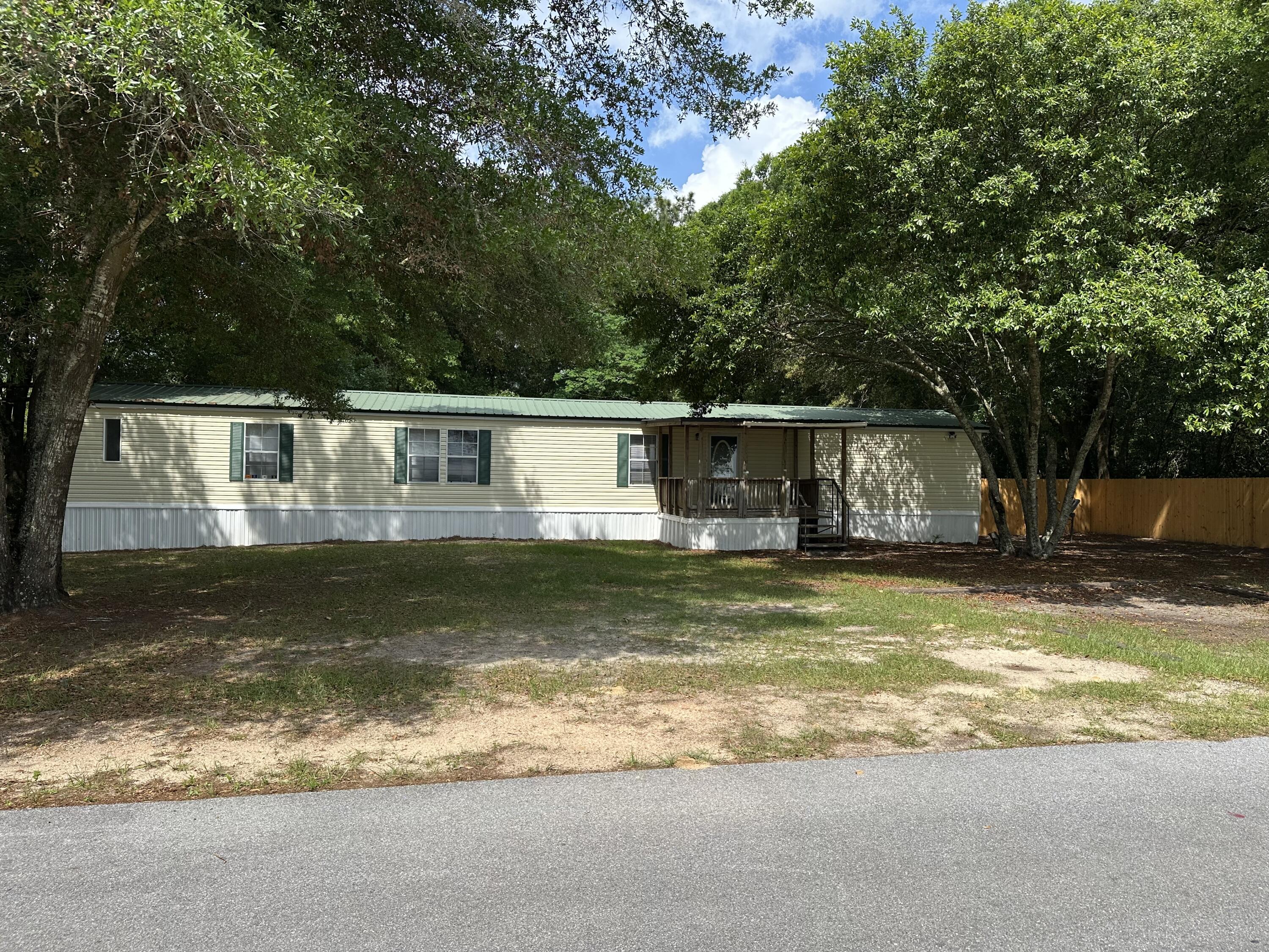 Great opportunity to own a well maintained 3 bedroom 2 bathroom home on almost a half acre lot in Holt! Delight yourself with the fireplace located in the corner of the living room which is open to the spacious kitchen with ample prep & storage space. Master bedroom features its own en suite with garden tub, separate shower and walk in closet. Two additional bedrooms with a full bathroom and a large laundry room complete the interior of the home. Large fenced in backyard is perfect for gardening, a play set, or even a pool! The possibilities are endless at this home, don't miss out!