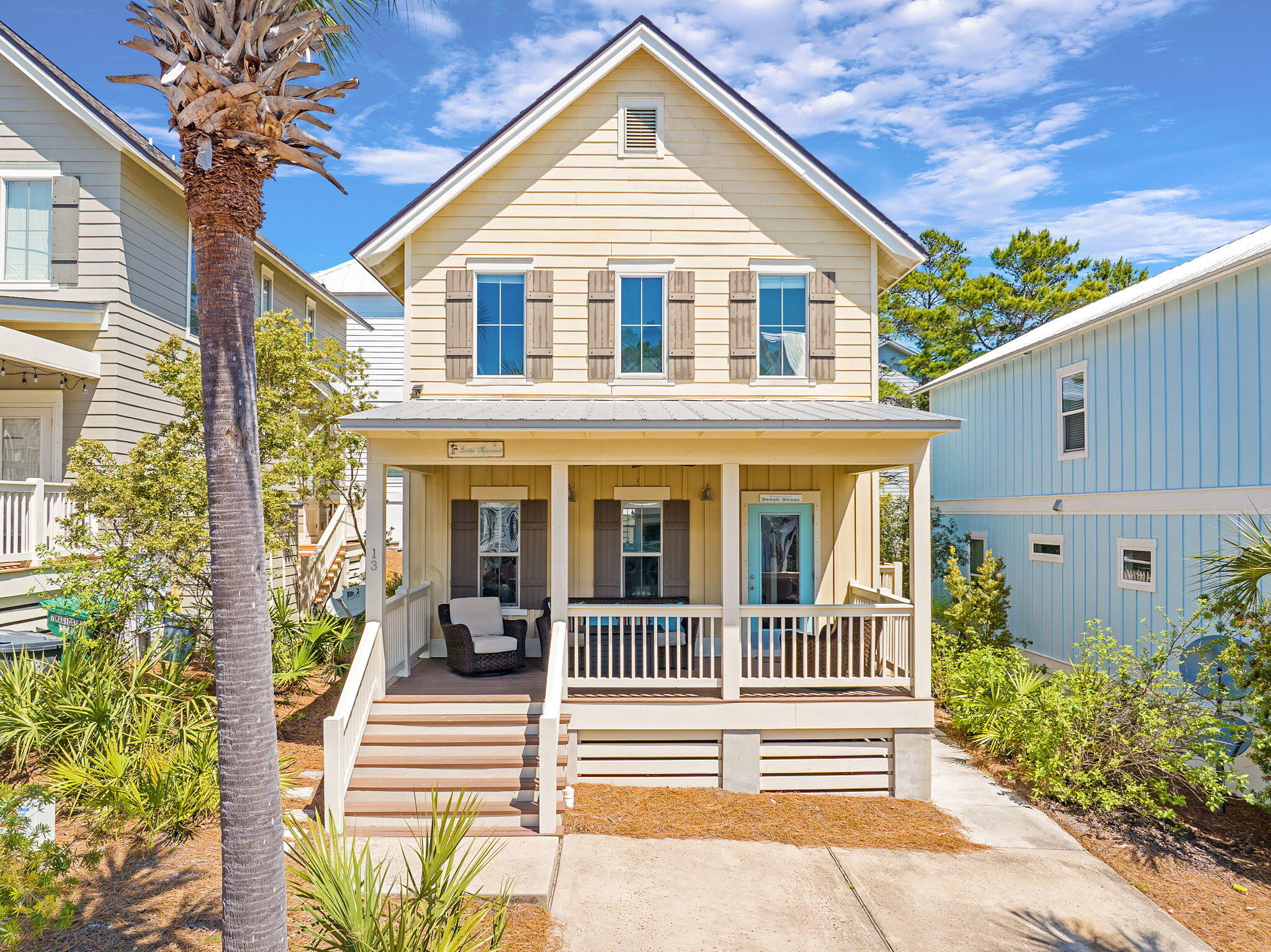Welcome to Lucky Number 13--a prime opportunity to own a Geoff Chick-designed 3-bedroom, 3.5-bath home just steps from the beach in one of the most desirable coastal markets, the west end of 30A. Maintained as a private second home for over a decade and never used as a rental, this property presents rare potential for immediate income generation or long-term appreciation.From the charming front porch to the bright and breezy living space, this home has all the ingredients of a high-performing vacation rental. The open-concept main level is flooded with natural light and anchored by a cozy gas fireplace, offering guests a relaxing retreat after a day in the sun. The kitchen, designed for both style and function, features a large island with breakfast bar seating, excellent prep space, and a layout that flows seamlessly into the dining and living areas, perfect for entertaining vacationing families or groups.
Step outside to the oversized deck, ideal for grilling or evening cocktails. And for beach gear and bikes? The custom-built storage shed in the back keeps everything tidy and ready for renters.
With a full-size laundry room, convenient half bath, and thoughtful bedroom layout, the home checks all the boxes for today's rental market, plus it comes with a built-in reputation for care and quality.
Whether you're looking to maximize short-term rental income or hold as a long-term appreciating asset, Lucky Number 13 delivers on location, layout, and untapped potential. Beach homes this close to the Gulf, and this rental-ready, don't hit the market often. Schedule your private showing today and capitalize on a rare investment gem.