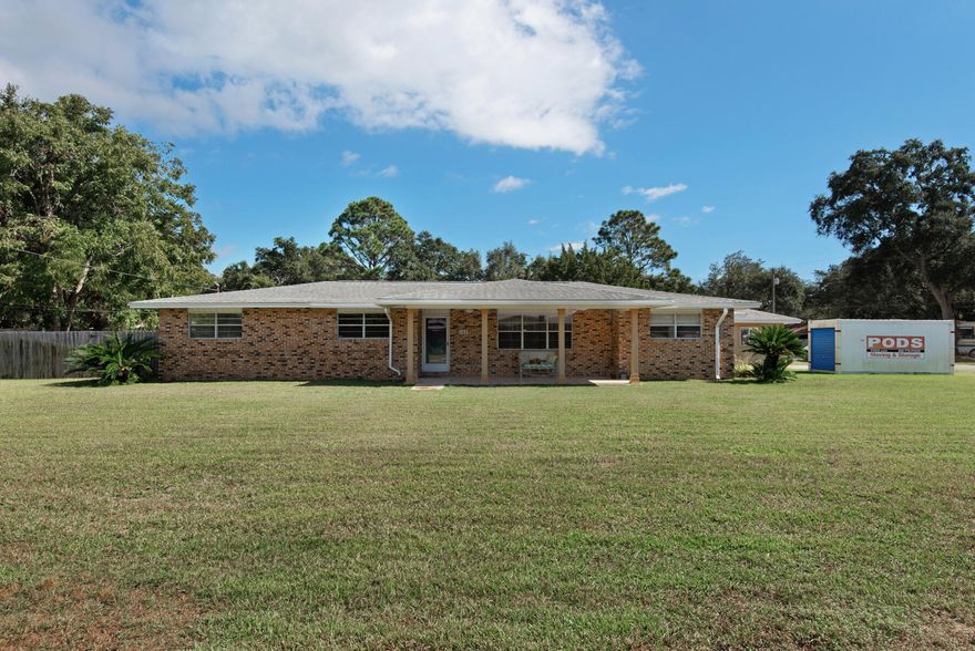 Are you looking for space? Great location? (15 minutes to beaches, short distance to Eglin/Duke)This large corner lot, partially fenced yard with room for your boat (or several boats), 4-car tiled garage, designated home office, tons of storage, 2 living spaces and a beautifully updated kitchen are not-to-be-missed!