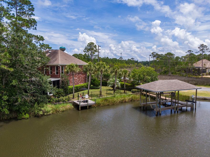 Extraordinary waterfront family estate on deep-water, Buck Bayou, consisting of two homesites with a carriage home and an additional 'cozy' room. This is a must-see property. Property one, 188 Harborview consists of 4200 sq. foot of classic architecture with luxurious interior detail. This expertly appointed home boasts an additional 1700 sq. feet of covered porches with exterior living and outdoor fireplace. Property two, consists of a true Florida bungalow (152 Harborview) with 1662 sq feet to give the estate a total of 5900 sq. feet!  These properties can be split up or remain as one homesite.  152 Harborview consists of hardi siding, a metal roof, screened porch and detached garage.