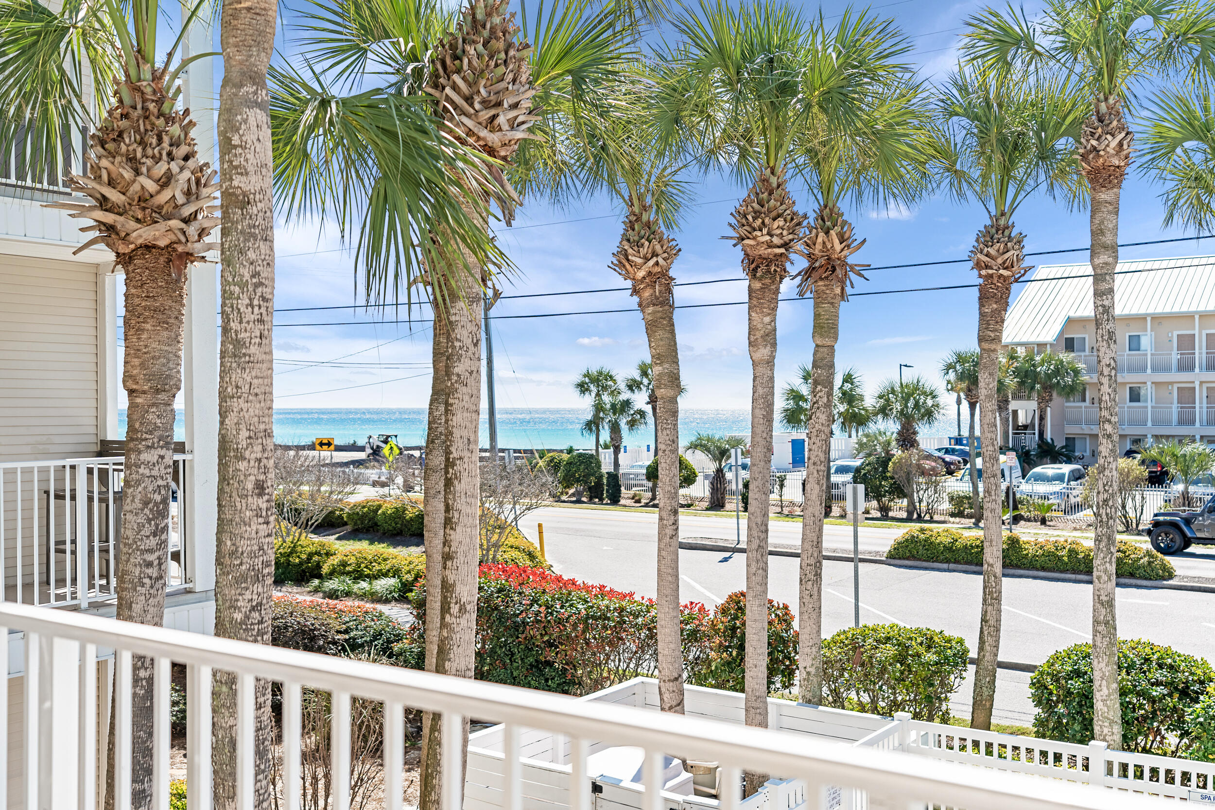 GREAT BEACH GETAWAY WITH PROJECTED INCOME UP TO 43K! This one bedroom one bath with built in bunkbeds in the hallway is sold fully furnished & accessorized. It has a great view of the Gulf of Mexico and is located just across the street from the public beach access. Double French doors open from the living area to a pretty patio to relax on while enjoying the gulf breeze. LVP flooring was installed 2023 - NO CARPET!  Grand Caribbean East is a great complex in the heart of Crystal Beach. It has a heated pool, grills, & picnic area. Enjoy a short walk to Camille's Restaurant & Sidewalk Cafe. Close to Destin Commons & many fun restaurants.