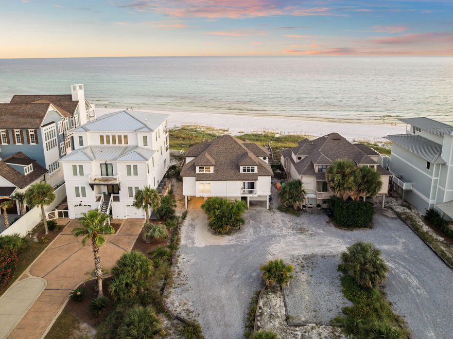 Rare Gulf front opportunity on pristine beachfront with private beach access. This oversized homesite is perfectly positioned on San Roy Road, a quiet dead-end street offering the unique advantage of being situated between the emerald waters of the Gulf of Mexico and the tranquil Eastern Lake.The property includes a charming 3-bedroom, 2-bathroom townhome with 2,145 square feet of comfortable living space. The open concept design seamlessly connects the kitchen, dining, and living areas, all enhanced by beautiful Gulf views. Step outside to the covered Gulf-facing patio where you can enjoy morning coffee with sunrise views or evening gatherings with spectacular sunsets as your backdrop. 
Conveniently located on the south side of 30A in the heart of Seagrove Beach, you'll find yourself perfectly positioned between some of the coast's most sought-after destinations. Seaside's charming shops and restaurants are just minutes to the west, while the luxury of Alys Beach and Rosemary Beach await to the east, putting world-class dining, boutique shopping, and coastal entertainment at your fingertips.

The generous lot size presents exciting possibilities for those dreaming of a custom coastal estate. Current county regulations allow one parking space per 900 square feet, providing ample opportunity for a substantial home. Recent construction in the area showcases the potential for luxury residences exceeding 9,000 square feet, demonstrating the remarkable development possibilities this site offers.

What truly sets this property apart is its extraordinary dual water access between the Gulf and Eastern Lake, creating endless recreational opportunities right at your doorstep. The private dead-end street ensures peaceful surroundings while the exclusive beach frontage means no crowded public access points to navigate.

Whether you envision this as your coastal retreat, a vacation getaway, or a sound investment opportunity, the existing townhome provides immediate enjoyment while you plan your next chapter. This rare combination of location, privacy, and development potential makes 95 San Roy Road a truly special offering in one of Florida's most desirable coastal communities.
