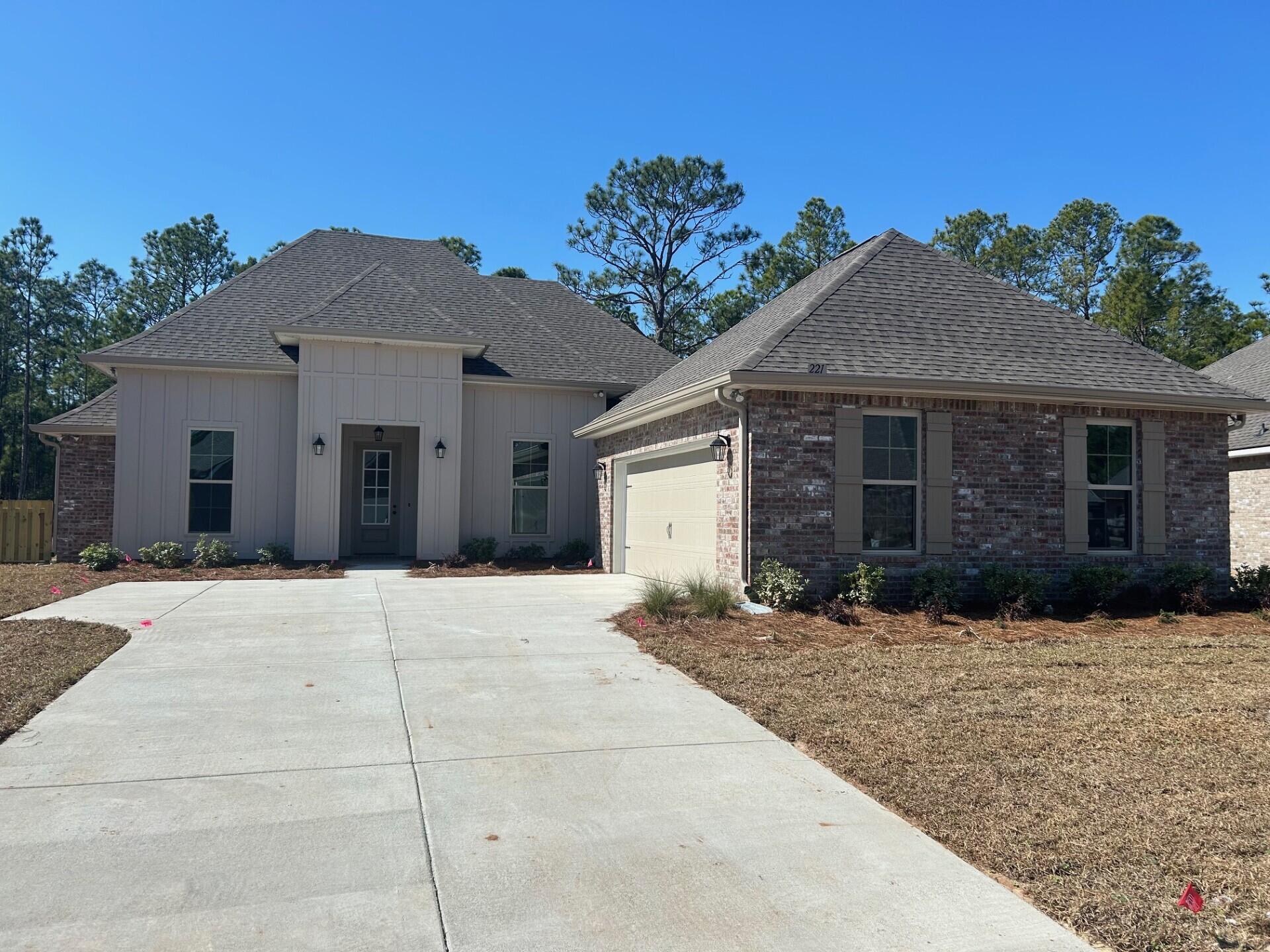 The RENOIR IV H in Bird Song at Hammock Bay community offers a 4 bedroom, 3 full bathroom, open design with flex space and breakfast area. Upgrades added (list attached). Features: double vanity, garden tub, separate custom tiled shower, and walk-in closet in master bath, kitchen island, walk-in pantry, boot bench and drop zone in mudroom, covered rear patio, crown molding, recessed lighting, smart connect WIFI thermostat, smoke/carbon monoxide detectors, landscaping package, architectural 30-year shingles, flood lights, and more! Energy Efficient Features: water heater, electric kitchen appliance package, vinyl low E windows, and more! Energy Star Partner.