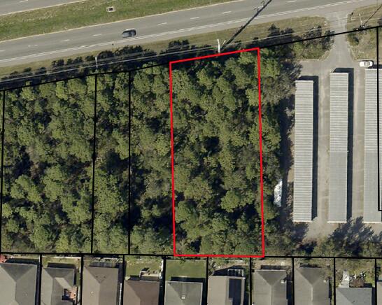 .63 commercial acre on Gulf Breeze Pkwy ( Hwy 98) in Gulf Breeze, vacant lot, great location and development parcel for commercial use, located next to Soundside Storage Units
