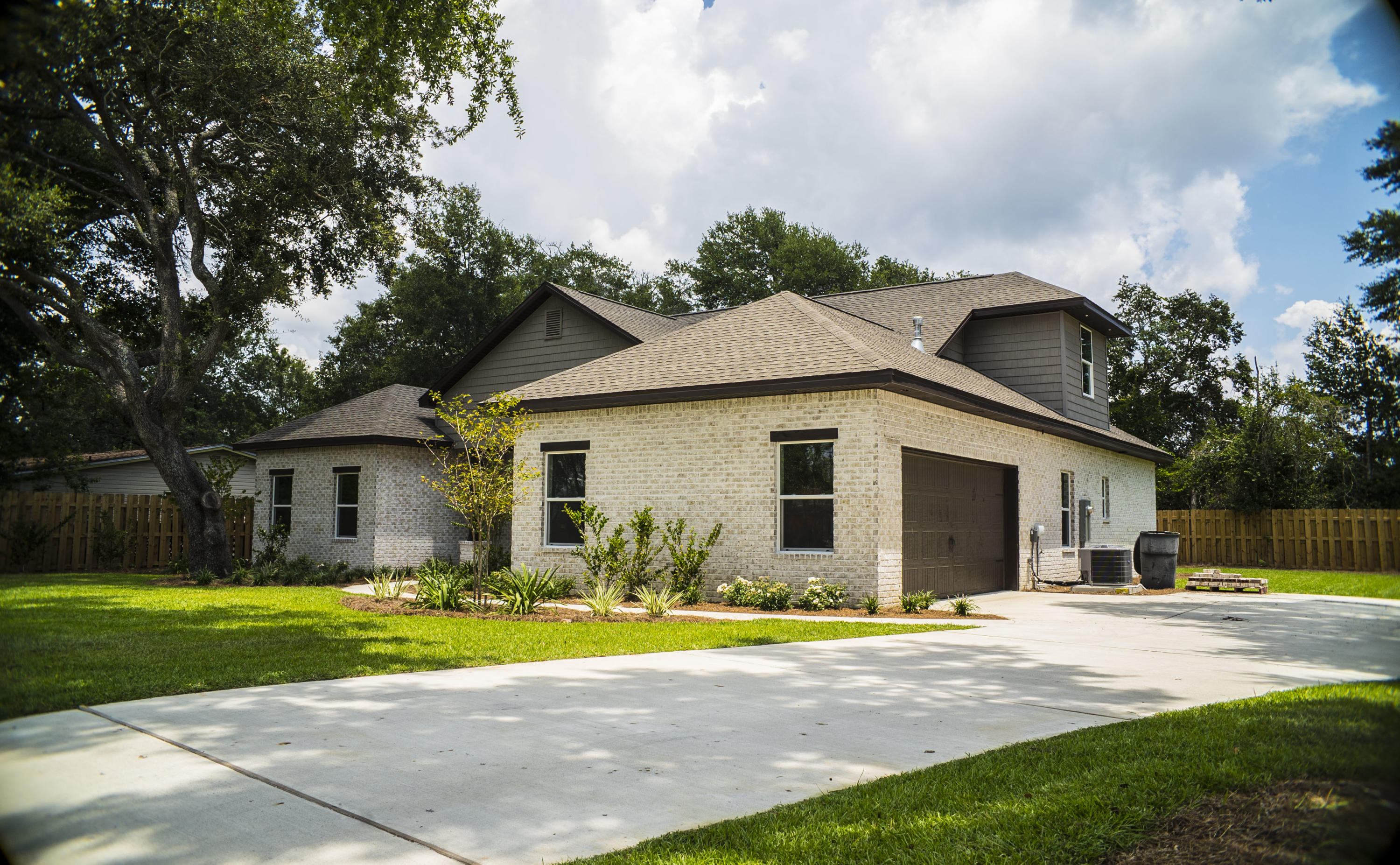 Brand New Beautiful Craftman/Ranch two-story home. Look no more this house has it ALL: Size, Location, and a great price! This Four Bedroom, Two bathroom house has a great lot with lush Forest behind it for privacy. On the second story, there is a very spacious bonus room that makes a great playroom, family room, theatre room, office, the possibilities are endless. Beautiful Tile floors, Kitchen has upgraded cabinets, Granite Countertops, Smudge-free Stainless Steel Appliances and even an island for extra storage and counter space. The property has a Privacy fence all around the property. Centrally Located near shopping centers, in a great neighborhood next to the soccer fields, this is a Prime Location. Located within a few miles from both bases Eglin AFB and Hurlburt Field AFB. Hard