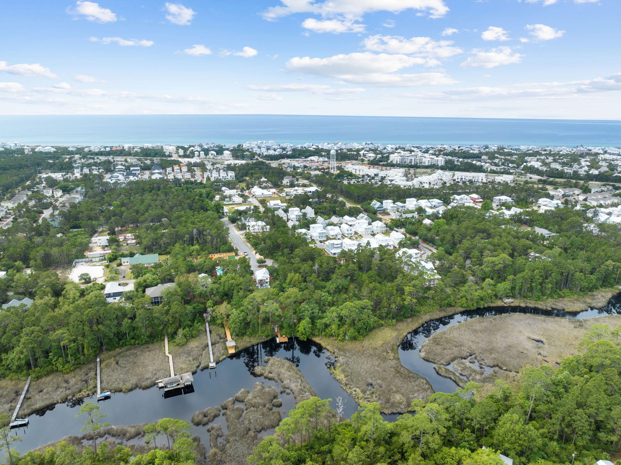 Oversized waterfront homesite positioned on Lake Powell and nestled in a peaceful gated community at Inlet Beach. Located in Inlet Beach future homeowners will enjoy a short walk to the beach as well as the exclusive communities of Rosemary Beach and Alys Beach.Lakeside is an exclusive and secluded low-density community of 21 homesites. Amenities include a covered cabana, pool, fireplace, restrooms, grill area and neighborhood dock. Lake Powell offers boating access to the beach as well as tremendous fishing and water-sports. Future homeowners will have ability to hop on their boat and be on the sugar white sand within a quick boat ride. The Coastal Dune Lake lifestyle is one unlike any other. No short term rental restrictions. Buyer to verify all dimensions.