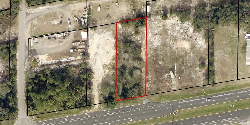 High visibility Commercial lot in Prime Location! 100' Frontage on Gulf Breeze Parkway in rapidly expanding area. 255' deep! Just Reduced 20K!!