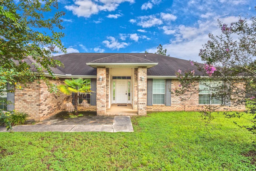 Beautiful home located in the highly sought after subdivision of Antioch Estates. This home is conveniently located South of I-10 in close proximity to multiple military bases, shopping venues, and entertainment. Once you walk into this all brick home you will be greeted with cathedral ceilings, a gas fireplace and 18-inch tile throughout the living room, hallways, kitchen, and bathrooms. All three bedrooms are carpeted and the master bathroom is a split vanity with a private toilet area. This home comfortably sits on a 1/2 acre lot with a two car garage, a paved driveway that can easily fit 4-6 parked cars and a storage shed for additional storage space. Home is covered with an existing home warranty in place. This home is USDA eligible which means 100% financing is available!