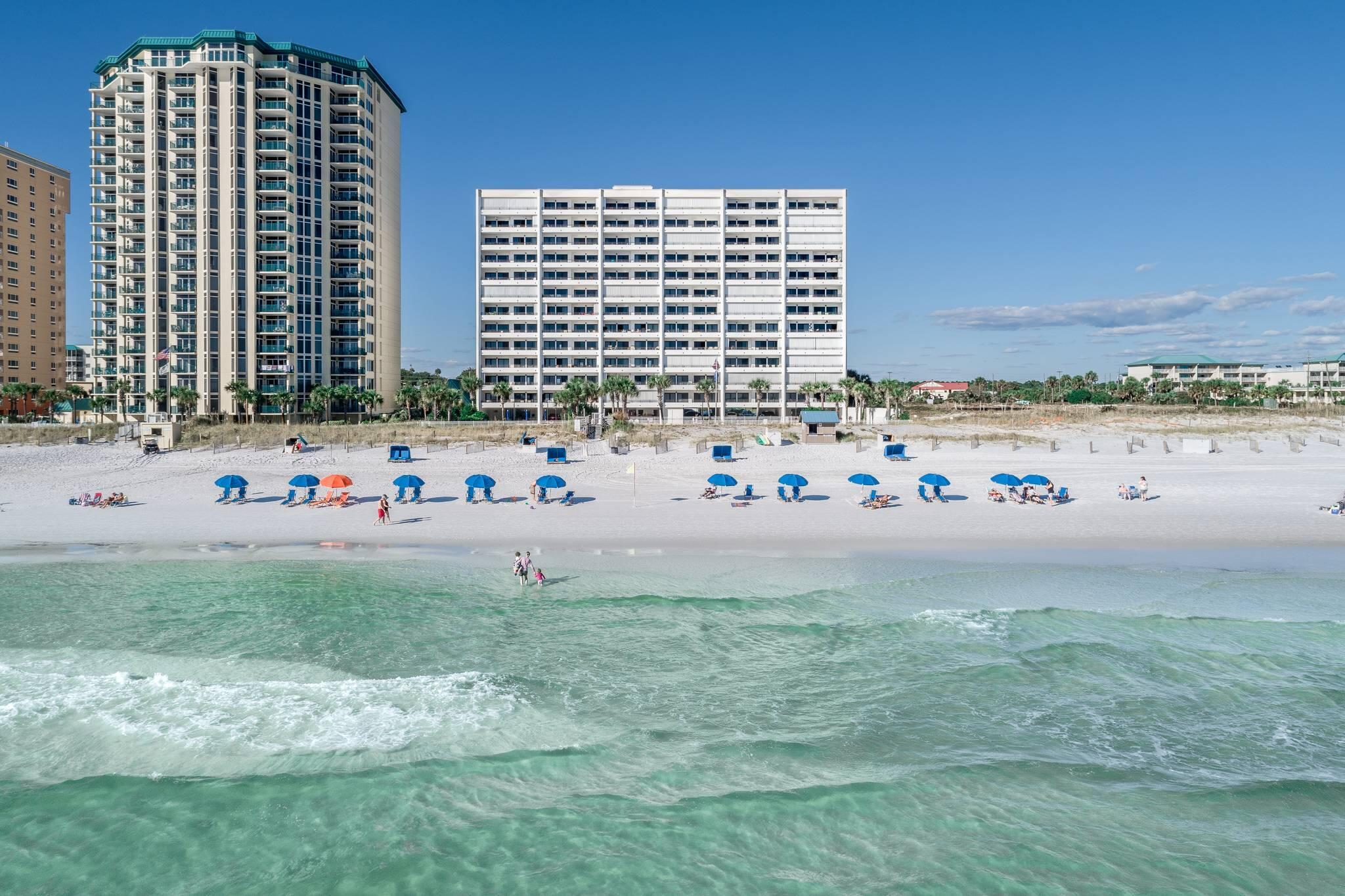 TOP FLOOR UNIT!Beachfront condo rental ready in popular Breakers East, located in the heart of Destin, Florida. Enjoy panoramic views from your personal and private 30 foot balcony. Unit 1203 is one of the few units with deeded covered parking. Sold fully furnished and rental ready. The complex features a total of 72 units spread across 12 floors. Destin Breakers East offers an array of amenities, including a seasonally heated pool, tanning sun deck, BBQ grills, picnic area, tennis, and pickle ball courts, shuffleboard, and 200 feet of private beach access.The location is ideal, just a short walk or drive from some of the best restaurants, shopping, and attractions that Destin has to offer.
