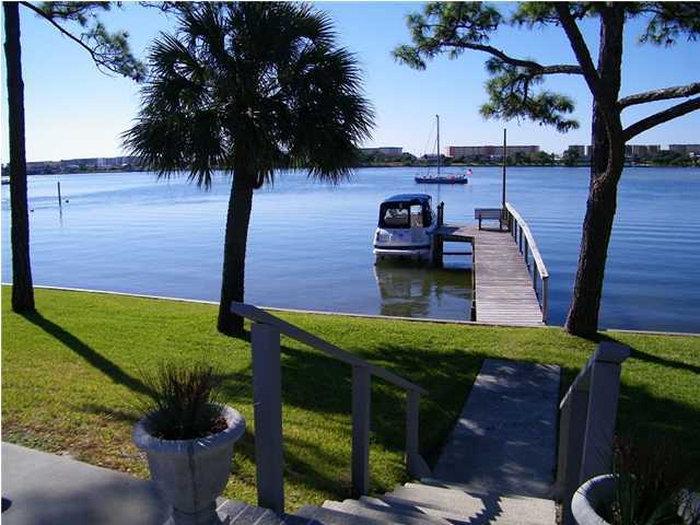 ASK US ABOUT OUR CURRENT MOVE-IN SPECIAL! This charming, waterfront community offers stunning views & a relaxed coastal vibe. Enjoy access to a beautiful in-ground pool overlooking the Intracoastal Waterway--perfect for soaking up the sun. This lovely two-story townhouse features stainless steel appliances, soaring cathedral ceilings in the living room, a separate dining area & a private back patio ideal for unwinding. The complex also includes two docks for added convenience & leisure. Sorry, no pets allowed. Don't miss this opportunity to live in a peaceful, well-maintained community with unbeatable amenities--schedule a tour today! All Coastal Realty Services residents are enrolled in the Resident Benefits Package (RBP) which includes renters insurance, HVAC air filter delivery (for applicable properties) and our best-in-class resident rewards program, and much more! More details upon application.
