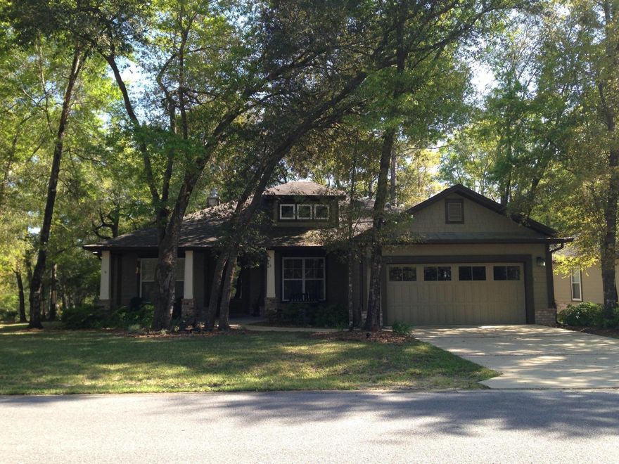 Quality construction in this beautiful showcase home. Some of the upgraded features include Bose Acoustimass 10 speaker surround sound system (5.1), ManaBloc plumbing system (NO plumbing joints), Exterior patio speakers, screened in patio, landscaping lighting, 9 foot ceilings and 8 foot doors, crown molding throughout and all windows and doors are wires for security. This home has been well cared for and as soon as you enter the front door you will feel at home with an open floor plan that is perfect for entertaining. The plan offers a formal dining room, large living room, kitchen with a breakfast bar and separate eating area. Kitchen features granite counters, custom cabinets,