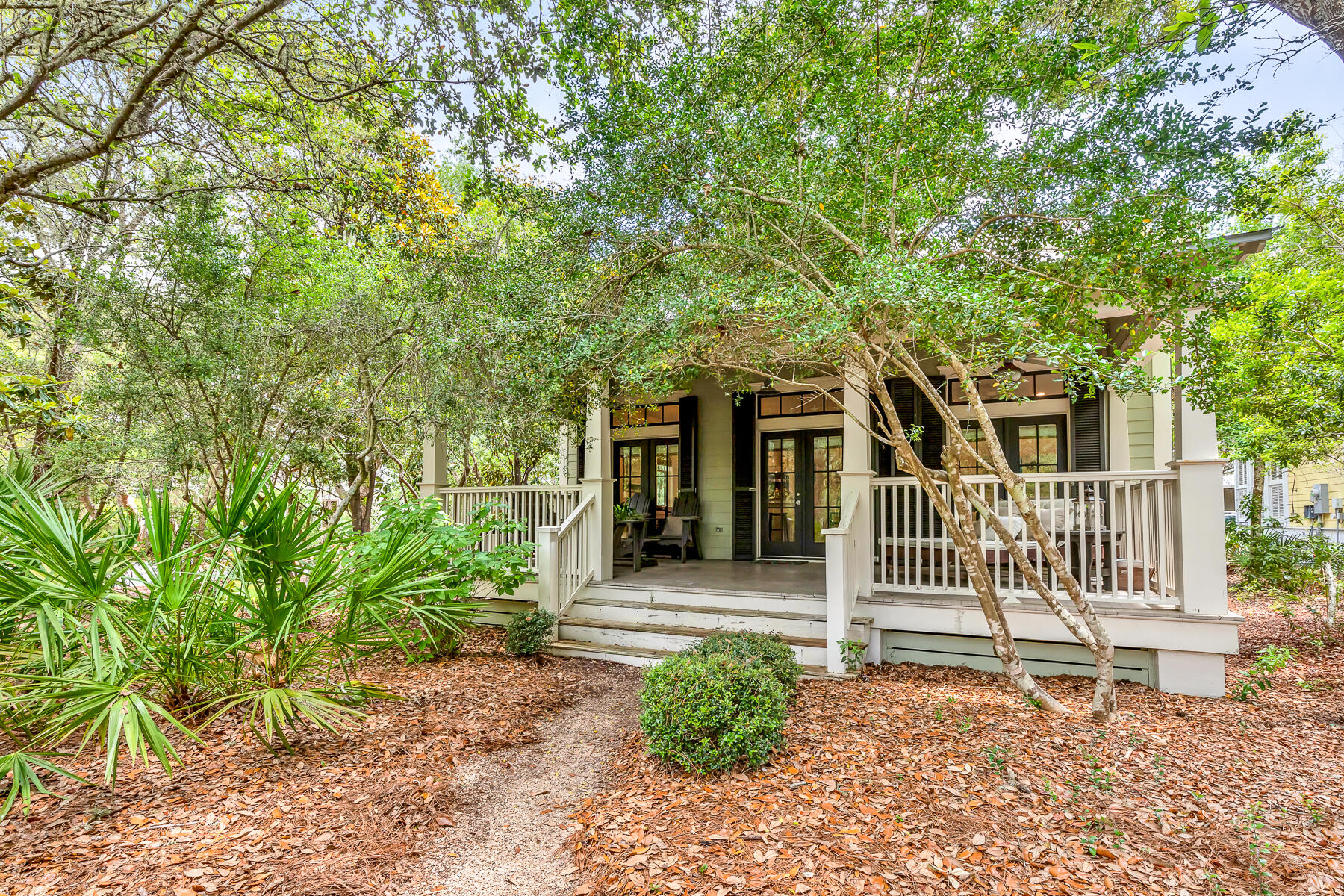 Welcome to 9 Lyonia Lane! This charming beach cottage is located in the amenity rich Watercolor Resort, just steps away from the tennis courts, the beautiful Watercolor Beach Club and white sand beaches of the Emerald Coast. Offered fully furnished, this 4 bedroom, 3 bathroom home offers plenty of room for the whole family. The coastal decor and classic finishes give the home a warm and inviting appeal. Equipped with a chef's kitchen featuring stainless steel appliances, this light and bright cottage boasts high ceilings, abundant windows and doors and wood floors throughout, this property is sure to wow. Enjoy two expansive porches one with swing bed - one overlooking a lovely preserve area. With access to the Beach Club and 5 other pools, tennis and pickleball courts, paddle board or K