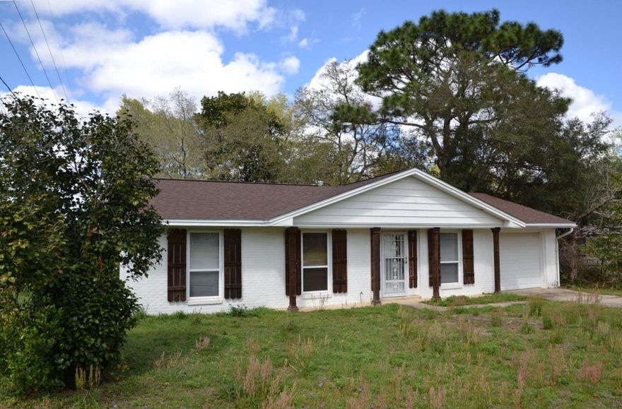 New roof shingles just installed March 2015!!! This affordable home was remodeled in 2006 and the windows are not original. Sitting on a large corner lot, this home is shaded by large trees in the chain link fenced back yard! You will love the 49x11 Family Room (dimensions include the second, 10x4 laundry room). The original laundry room, adjoining the Master Bedroom's 1/2 bath, could easily be incorporated into an expansion of the Master Bedroom Suite, adding a shower. The large country Kitchen that opens to the Family Room, comes fully equipped with all appliances, new in 2006, including a smooth top range. SELLER WILL PAY $2,500 in CLOSING COSTS AT FULL LIST PRICE, in addition to title insurance & stamps on the deed. Be sure to take a look today!