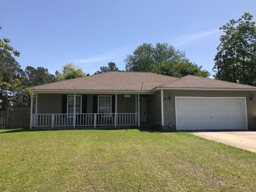 Beautiful 3BR/2BA home great location! Close to beach, shopping and Hwy 98 & Hwy 87. SPACIOUS LIVING ROOM with laminate wood flooring and corner STONE FIREPLACE with raised hearth and Mantel. Large KITCHEN with plenty of cabinets, counter space, pantry, NEW RECESSED lighting and upgraded appliances..STAINLESS STEEL APPLIANCES are included. Spacious MASTER SUITE, Walk in Closet and RENOVATED BATHROOM! 2-CAR GARAGE with Workbench a HUGE PRIVACY FENCED backyard with CRABAPPLE Tree and Oak Trees. FIRE PIT and concrete PATIO for outside enjoyment. IRRIGATION SYSTEM on well.