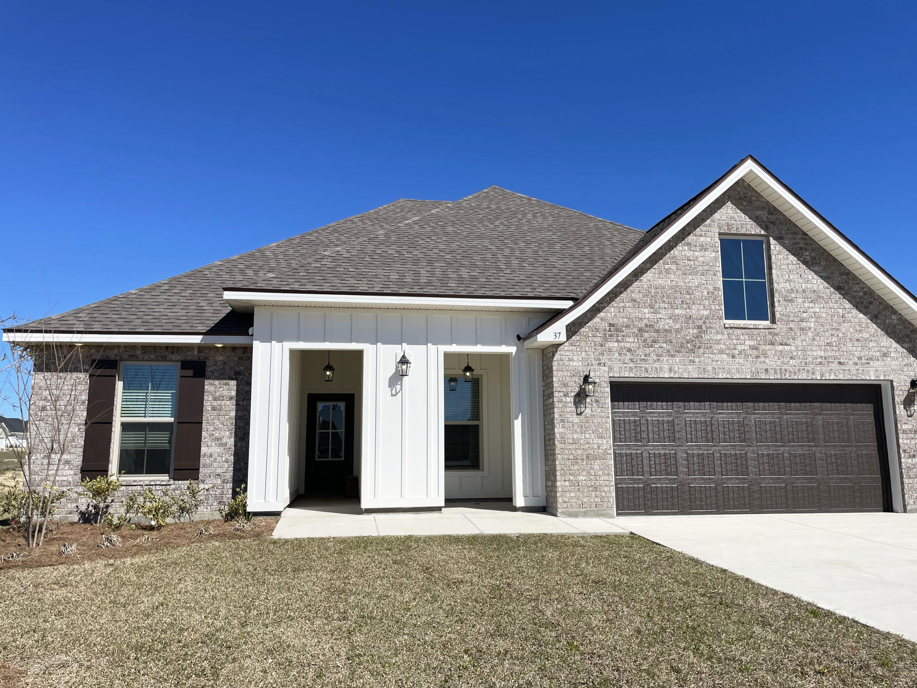 Awesome builder rate plus FREE window blinds. Restrictions apply.The HICKORY III G in The Bluffs at Lafayette community offers a 5BR, 3BA open design. Upgrades added (list attached).Special Features: double vanity, garden tub, separate shower, and walk-in closet in master bath, kitchen island, walk-in pantry, boot bench at garage entry, formal dining room, separate den, covered porches, recessed lighting, crown molding, ceiling fans in living and master, framed mirrors, smoke/carbon monoxide detectors, landscaping, architectural 30-year shingles, flood lights, and more!Energy Efficient Features: tankless gas water heater, kitchen appliance package, vinyl low E windows, and more! Energy Star Partner.