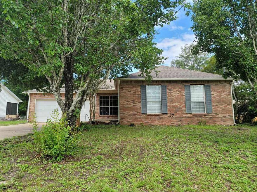 Brand new A/C being installed this week! Septic tank recently pumped and ready to go! Great 3 bedroom 2 bath house in Gulf Breeze, Fl. Walk into a spacious living room with a brick fireplace at the center. The living area opens to a lovely kitchen and dining area. On the other side of the kitchen is the laundry room and access to the 2-car garage. Just off the dining area is a large master bedroom with vaulted ceilings and private bath. The master bathroom features double vanity and shower/tub combo. Down the hallway on the other end of the house, you will find two large bedrooms and a hall bathroom. Brand new carpet has been installed in all the bedrooms.