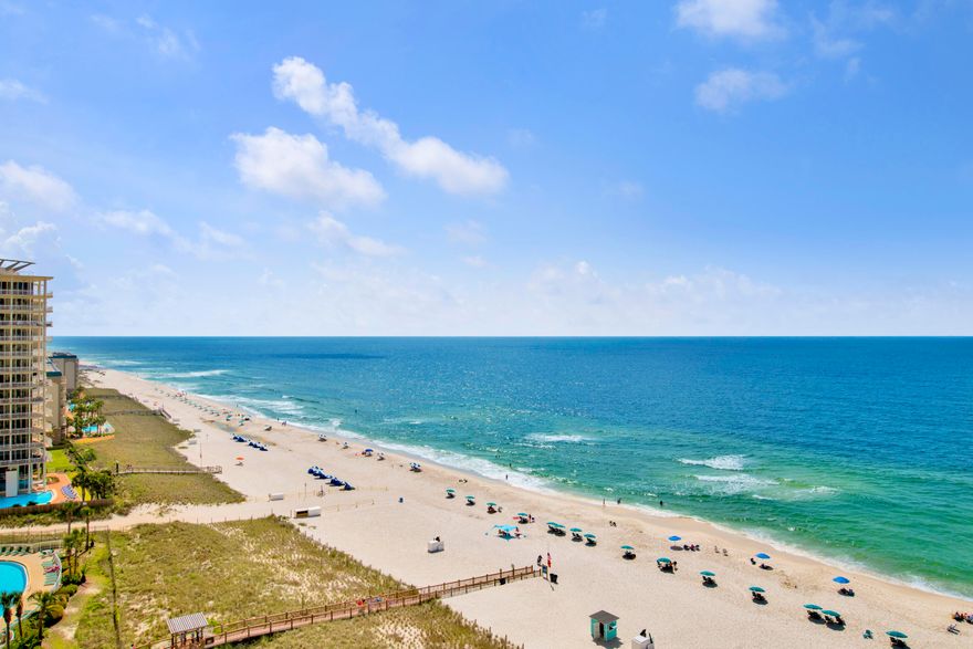 Welcome to Beach Colony West 12A - where breathtaking Gulf views & effortless coastal living come together. This GULF FRONT 3-bedroom, 3-bath condo is a dreamy escape, offering style, comfort & panoramic beauty from the 12th floor. Step inside & feel the serenity of soft coastal hues, high 9' ceilings, & an open-concept layout designed to highlight the view. The spacious living & dining areas flow out to an oversized balcony--one of the largest on the Key--perfect for savoring sunrise coffee or winding down in the evenings while overlooking the emerald shoreline. The Gulf-facing primary suite features a king bed, balcony access, & a spa-style ensuite with a soaking tub overlooking the water, double vanity, & a walk-in shower. Both guest bedrooms offer private balconies & ensuite baths, givi