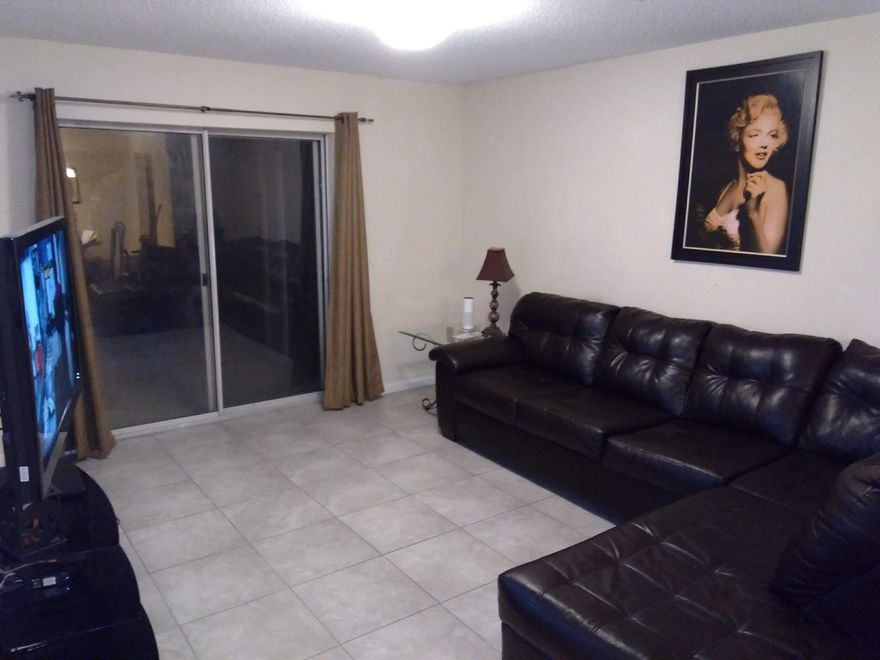 Qualifies for 100% USDA financing and Handicap accessible. Two bedroom, two bath ground floor unit. Beautiful new large gray tile throughout. New faucets, decorative new light fixtures and new toilets. Storage room and small patio. Close to the beach and shopping. HOA fee includes cable. Freshly painted. HOA is repairing the siding which is included in the reserves. Home warranty included. Across from the dog park. Pool, exercise room and playground. All measurements to be verified by the buyer