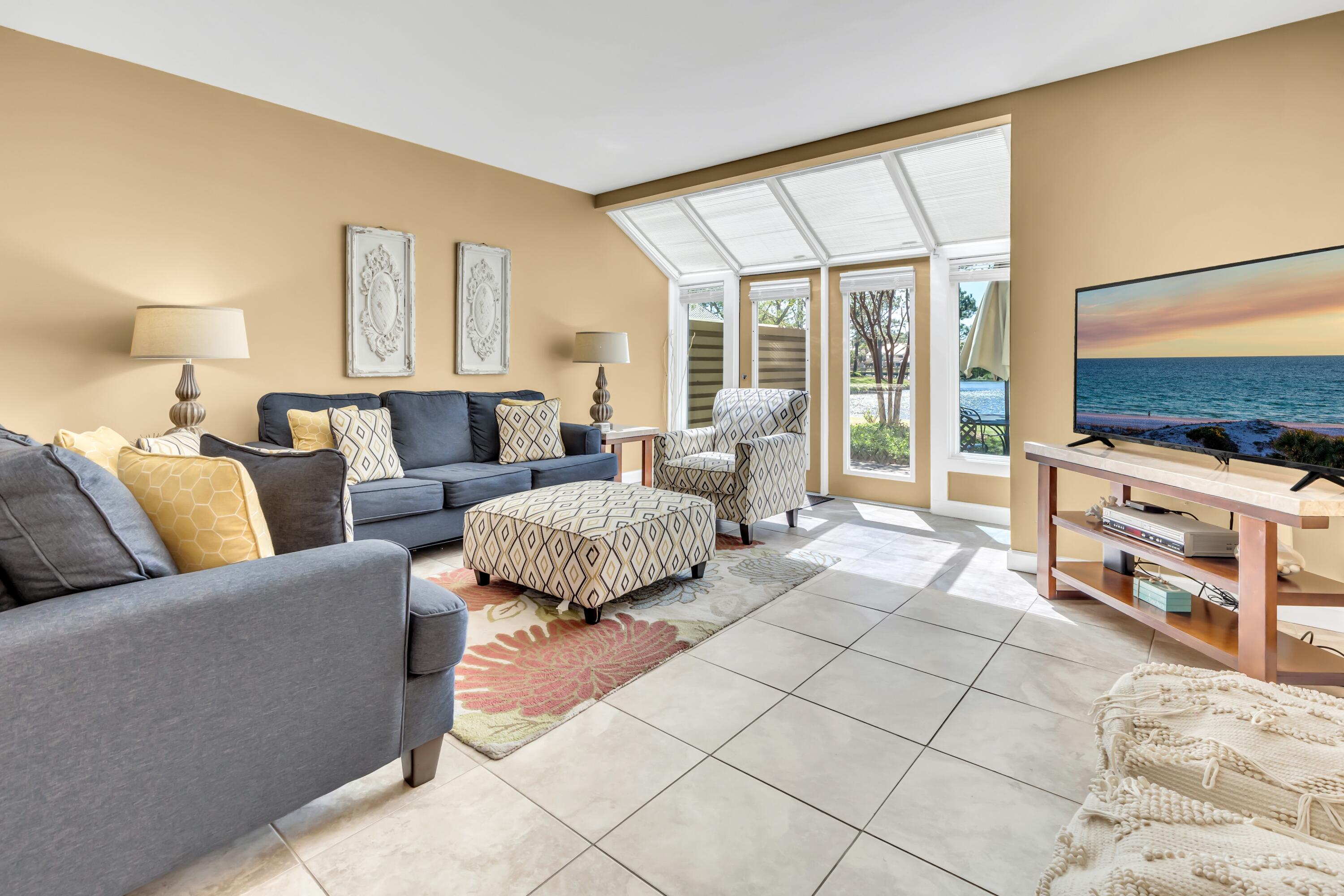 Discover the charm of this lakefront home in the sought-after Beachwalk Villas, offering a serene setting with picturesque views of Horseshoe Lake, and a NEW ROOF in May of 2025! This welcoming residence features an efficiently designed open floor plan, where the kitchen opens seamlessly into the dining and living areas, creating a comfortable and functional space. The main floor is adorned with elegant travertine tile, enhancing the home's overall appeal. The property includes a private front courtyard, providing a peaceful retreat, and an expansive back patio that offers stunning lake views, perfect for relaxing after a day at the beach. Recent updates include new LVP flooring on the second level, ensuring durability and ease of maintenance, along with tastefully updated bathrooms that add a modern touch to the home.
Situated within the Beachwalk Villas on the beachside of the Sandestin Golf & Beach Resort, this home is conveniently located just a half-mile from beach access. Residents can also enjoy the nearby Beachwalk community pool for a refreshing dip or lazy days lounging by the water. Directly across the street are The Market Shops, offering fabulous dining and shopping options.
This property is ideal for those seeking a lifestyle of convenience and relaxation, whether as a full-time residence, a vacation retreat, or a potential rental opportunity. It combines practical living with leisure amenities in a fantastic location.
As an introduction to the Sandestin lifestyle, we invite our new owners to explore amenities that make Sandestin special. The listing brokerage and seller(s) are presenting the buyer(s) of this property with (2) 90-minute rounds of Tennis court time, a golf foursome at one of our three championship courses, and a round of golf for up to four (4) players at the unrivaled Burnt Pine Golf Club.
Sandestin Golf and Beach Resort features more than seven miles of beaches and pristine bay front, four championship golf courses, 15 world-class tennis courts, a 226-slip marina, a fitness center, spa and celebrity chef dining. Shop, dine and play at the charming pedestrian village, The Village of Baytowne Wharf and more. Inside the gates of the resort, residents enjoy a balanced lifestyle of high-class living, spanning the 2,400 acres from the beach to the bay. Everything within the gates of the resort is accessible by golf cart or bicycle. The entire resort is interconnected by miles of pedestrian, bike and golf cart paths that weave through groves of live oaks, meandering past natural lagoons, fountains, man-made lakes, and meticulously landscaped fairways.