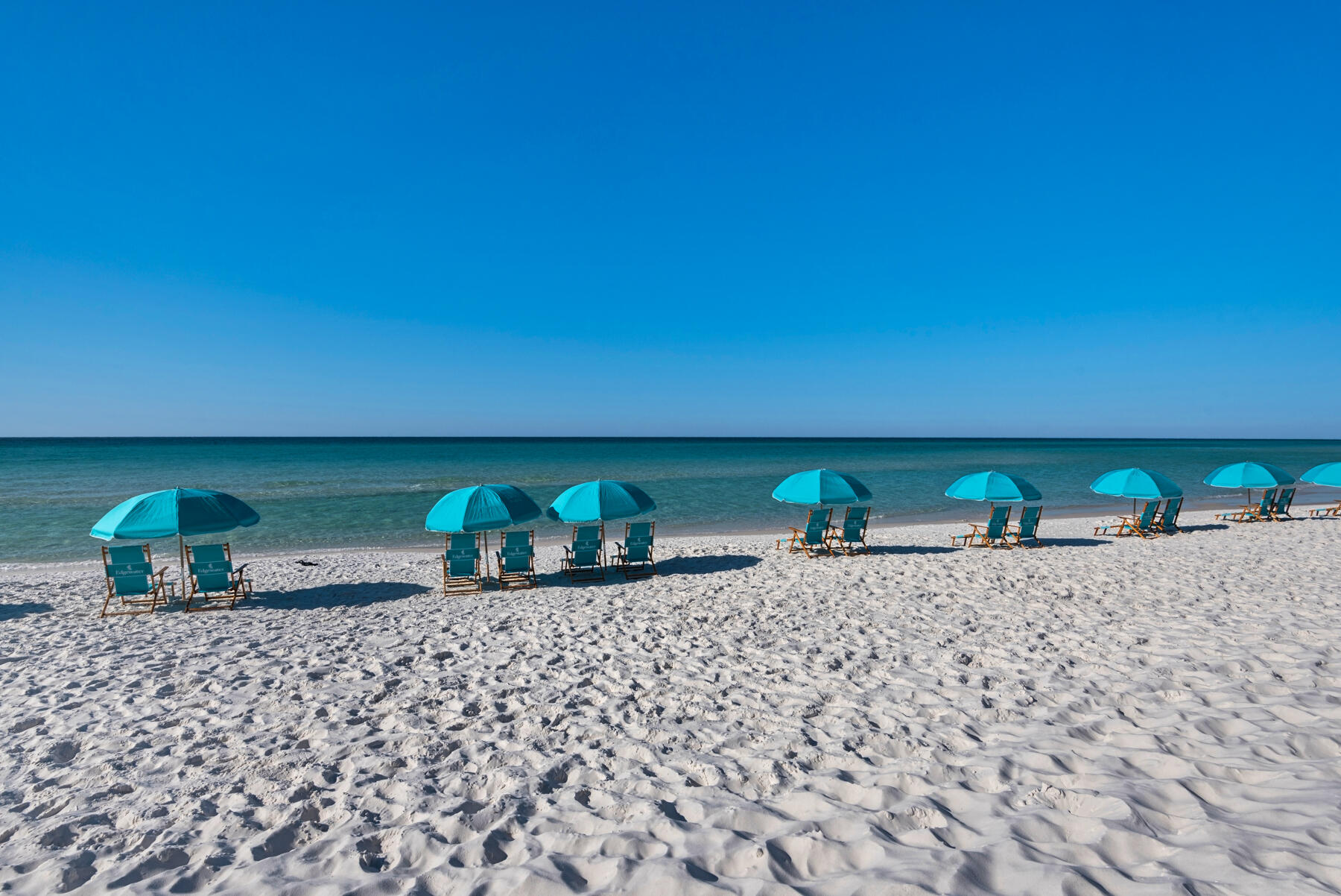 Experience beachfront living at its finest with this stunning ground floor condominium in the desirable Edgewater Beach Resort. Boasting incredible views of the Gulf of Mexico, this spacious 2-bedroom, 2-bathroom unit offers the perfect blend of beauty and convenience.Upon entering, you'll be greeted by an open and airy layout, with the living area seamlessly flowing into the dining space and kitchen. The oversized patio, accessible directly from the unit, serves as an extension of your living space and provides easy access to an expansive ''backyard'' area, just steps away from the pools and private beach.Ideal for entertaining, the well-appointed kitchen features modern appliances, ample cabinetry, and a convenient breakfast bar. Whether you're hosting a dinner party or enjoying a quiet meal with loved ones, the dining area offers a picturesque backdrop of the Gulf.

The master suite is a true retreat, complete with a private ensuite bathroom and direct access to the patio. The second bedroom is equally inviting, and the additional sleeping arrangements allow for hosting extra guests comfortably. With this unit being offered fully furnished and rental ready, it presents an excellent investment opportunity.

Edgewater Beach Resort is a gated community that boasts an array of well-maintained amenities. Take a dip in one of the two pools, including a heated pool for year-round enjoyment, or relax in the waterfall spa and wading pool. Stay active at the fitness center, engage in friendly competition at the game room, or let the little ones have a blast at the children's playground. Sports enthusiasts will appreciate the putting green, shuffleboard area, and basketball court. And with approximately 425' of private beach, you'll have plenty of space to soak up the sun and enjoy the sand between your toes.

Don't miss out on the opportunity to own this exceptional beachfront condominium that offers not only breathtaking views but also a host of resort-style amenities. Schedule your private viewing today and start living the coastal lifestyle you've always dreamed of!

**** Complementary design services included****
