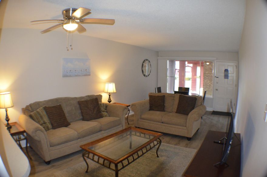 Enjoy peaceful Bayou views from this charming 1-bedroom, 1-bathroom condo. This unit features LVP flooring throughout and an updated kitchen complete with a stove, microwave, refrigerator, and dishwasher. The bedroom opens to a private patio, perfect for relaxing and taking in the water views.The community offers a beautiful pool overlooking the Bayou, a fishing pier, and boat slips for residents to enjoy. On-site laundry facilities add convenience, and the unit includes its own assigned parking space.This unit can be sold fully furnished and  move in ready.