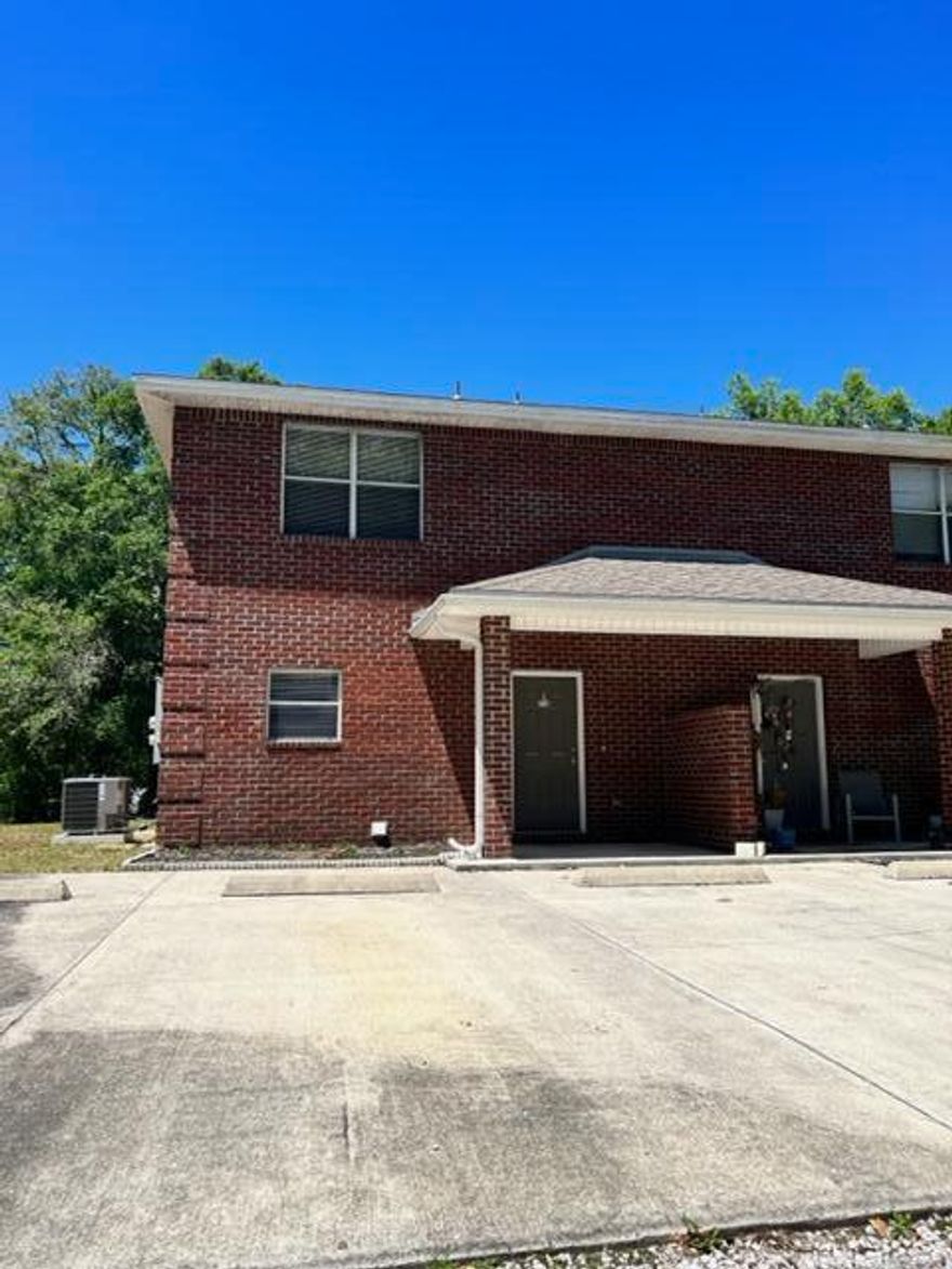 Two story 2 bedroom, 1.5 bath townhome. Wood laminate and tile flooring in the common areas with carpet on stairs and in both bedrooms. Back patio is covered. New tile downstairs, granite in kitchen. Call Coastal Realty for more information. *All Coastal Realty Services residents are enrolled in the Resident Benefits Package (RBP) which includes renters insurance, HVAC air filter delivery (for applicable properties) and our best-in-class resident rewards program, and much more! More details upon application.*