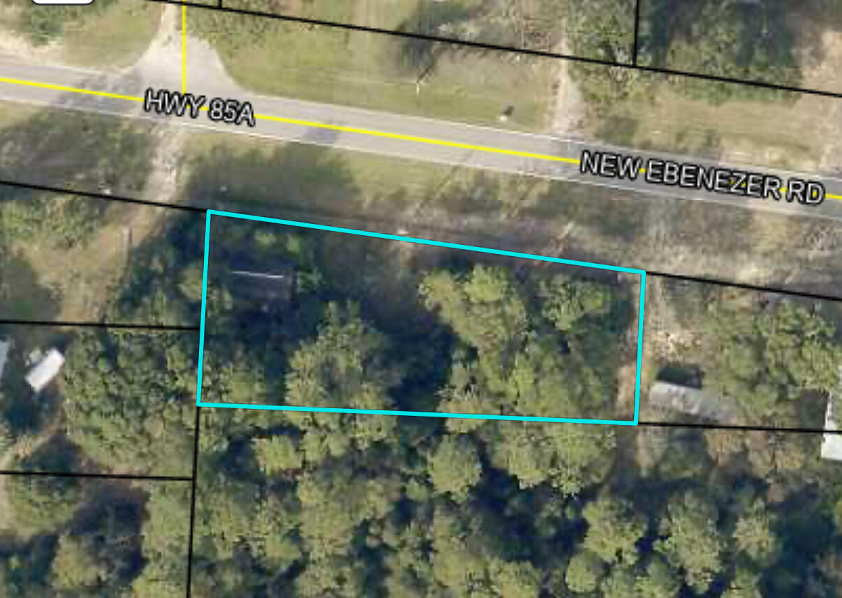 Nice level lot in Laurel Hill. An existing structure is on the property, but is being given no value due to it's condition. Water tap (Laurel Hill Water) and power believed to exist on the property. Buyer to confirm this information to their satisfaction.