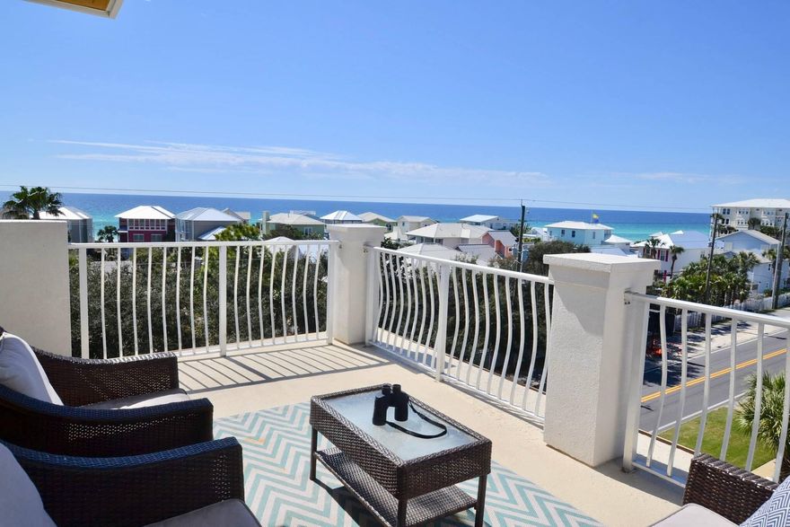 This PRIME, END unit in Summer Place on 30A has magical , unobstructed views of the Gulf of Mexico. Sunsets are incredible from the private rooftop! It's a short, easy stroll to the beach, dining and shops of Gulf Place and Abacos. This townhome has 4 bedrooms, 4 baths, wood flooring, granite counters with some shiplap updates. It also has a nice back deck for grilling and one car garage. There is a new refrigerator, dishwasher, hot water heater, 2 new acs and shiplap.
