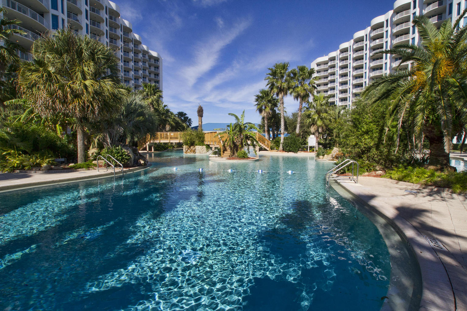 Larger Floor plan for the 2 Bedroom 2 bath units. This unit comes fully furnished & ready to be occupied. The Palms Dues Covers it all..(All utilities including electric & Internet as well) Amenities include an expansive lagoon pool, spas, a children's pool, restaurant and lounge with covered outdoor seating, conference and wedding facilities, a luxury spa, fitness/cardio center, lighted tennis courts, basketball court, jogging trail, playground, & Parking Garage. Short Term rentals allowed.