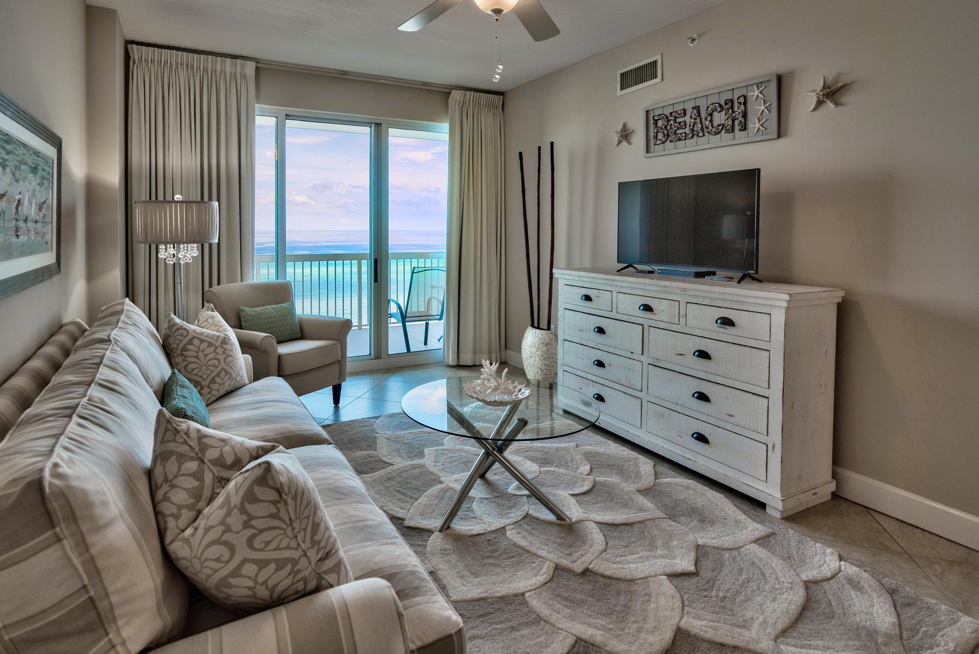 Phenomenal fully updated 2BR Gulf front condo with a bunk room & incredible views! This is a prime location in the complex on the desirable 8th floor - low enough to hear the waves from the balcony, yet high enough for privacy. This unit has been beautifully updated & well-maintained. Stunning 20'' porcelain tile flooring extends throughout the dining & living area and there is new carpet in the bedrooms. You will feel a sense of ease the moment you step into the unit with beautiful new furniture, fresh paint & inviting coastal decor. The unit has been professionally decorating and every detail is complete from the luxurious dining chandelier, updated fixtures, new appliances, custom drapes, mosaic tile backsplash, new cabinet pulls, vanity lights, mirror moldings & even new mattresses!