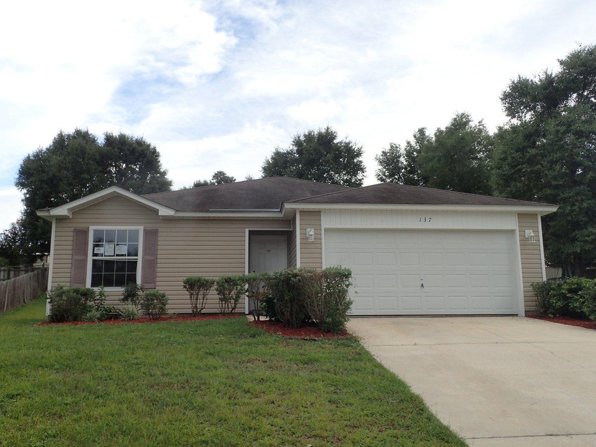 Situated in the conveniently located neighborhood of Ridgecrest Estates, this Fannie Mae HomePath REO property is just what you are looking for. Built in 2005, this 4 bedroom split bedroom design home has vaulted ceilings, open kitchen floor plan with bar-top and new appliances. Freshly painted and with new carpet and vinyl, this home would certainly pass any financing inspection. Exterior boasts vinyl siding, landscaping and 2 car garage. Call today to set up your showing of this home!
