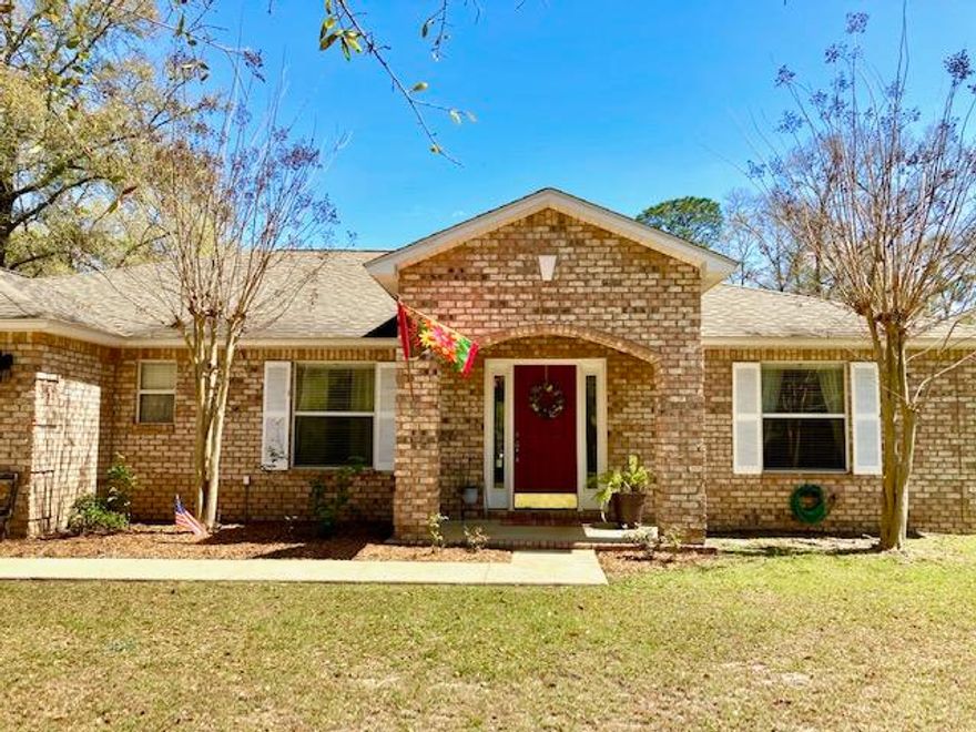 BEAUTIFUL CONTEMPORARY BRICK HOME WITH AN EXTRA VACANT LOT!  3BR 2BA home is located in Pleasant Ridge S/D -- quiet country living, yet close to town and an easy drive to the beach, Eglin AFB, and Ft. Walton. This spacious home features stainless appliances and large granite breakfast bar open to the main living area.  Split floor plan with MBR & MBA on one side and 2 Bedrooms & a Bath on the other.  Two additional rooms can be used as a dining room, den, or office for your family.  Huge fenced back yard! Best of all this property contains an entire half-acre adjoining lot where you can build a shop, a pool, or even sell it off for extra income -- an entire new home can be built on the additional lot!.  You won't find another listing with this kind of space & versatility for under $300,000