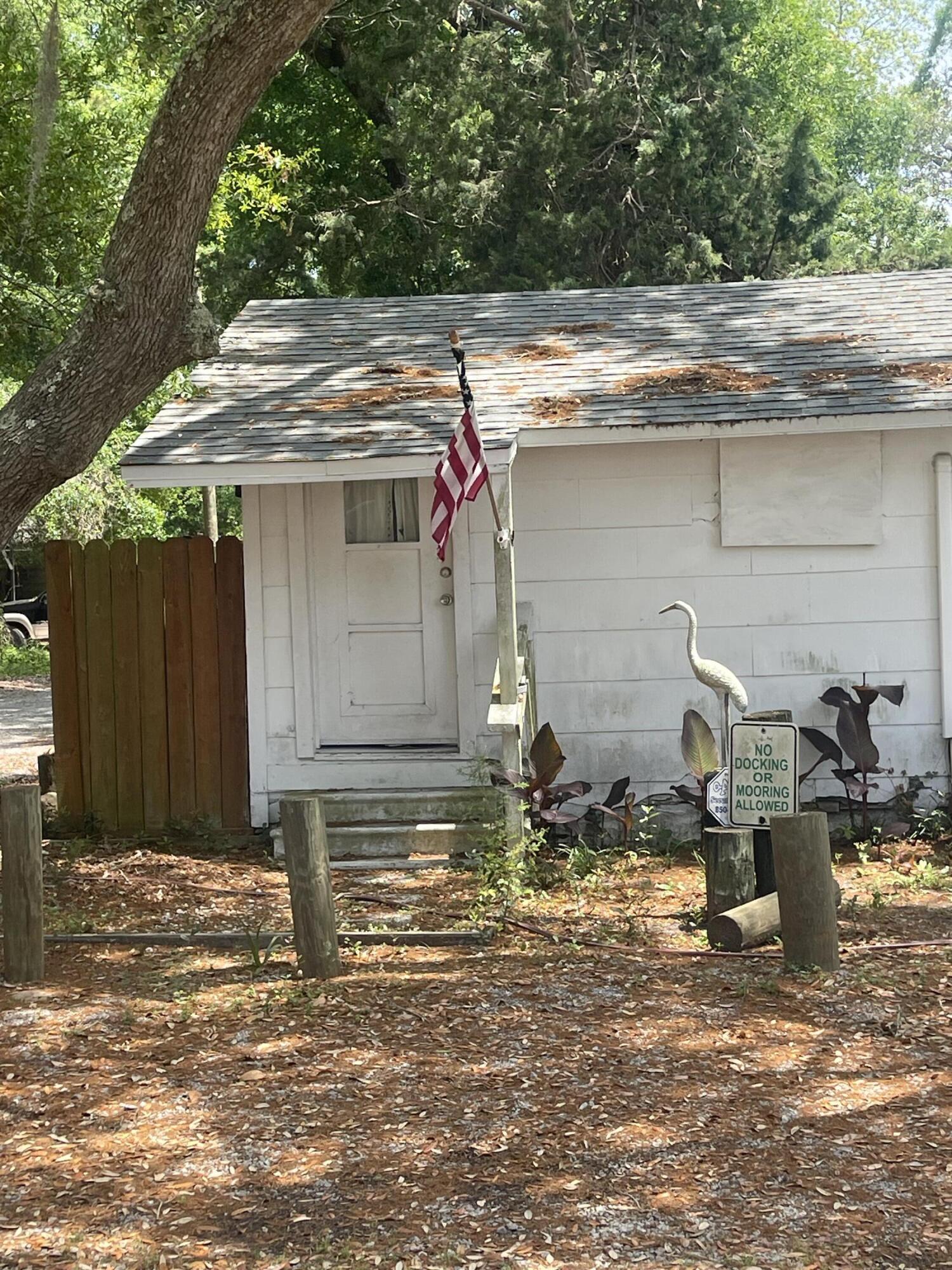LOCATION,LOCATION,LOCATION, What an amazing opportunity to own an adorable FL COTTAGE!! Downsizing? Retirement? Airbnb?? Fishing cabin?.. the possibilities are endless! Step outside your door and you'll be sure to feel you're in a tropical paradise with the calming bay breeze and open views overlooking the Choctawhatchee Bay. Not on the water but within a stone's throw. This home needs work and is being sold 'AS IS' for CASH ONLY. Roof replaced in 2021, and yes it has a charming wood stove but the owner also added a mini split 2021 for an efficient way to heat and cool. The bathroom tub/shower was remodeled 2021 finished with a tile shower. The hot water heater is 1992. RV hook up! Don't wait to own a piece of paradise at this price! This home was built in 1953 and may have hazardous materials used in construction. It is the sole responsibility of the buyer to inspect the property to determine its condition and verify all property facts important to the buyer for their purchasing decision. The BUYER agrees to hold harmless the two listing Agents (Haiden Shemer and Elizabeth PB Bell), Lokation Real Estate and the respective selling agents/realtors from any and all liability regarding the property condition and/or materials used in construction. Listing agent has resourced information from the County Property Appraiser's website. While the listing agent believes that the acquired information is accurate and true, the buyer and/or buyer's agent should verify all details related to this property prior to purchase.