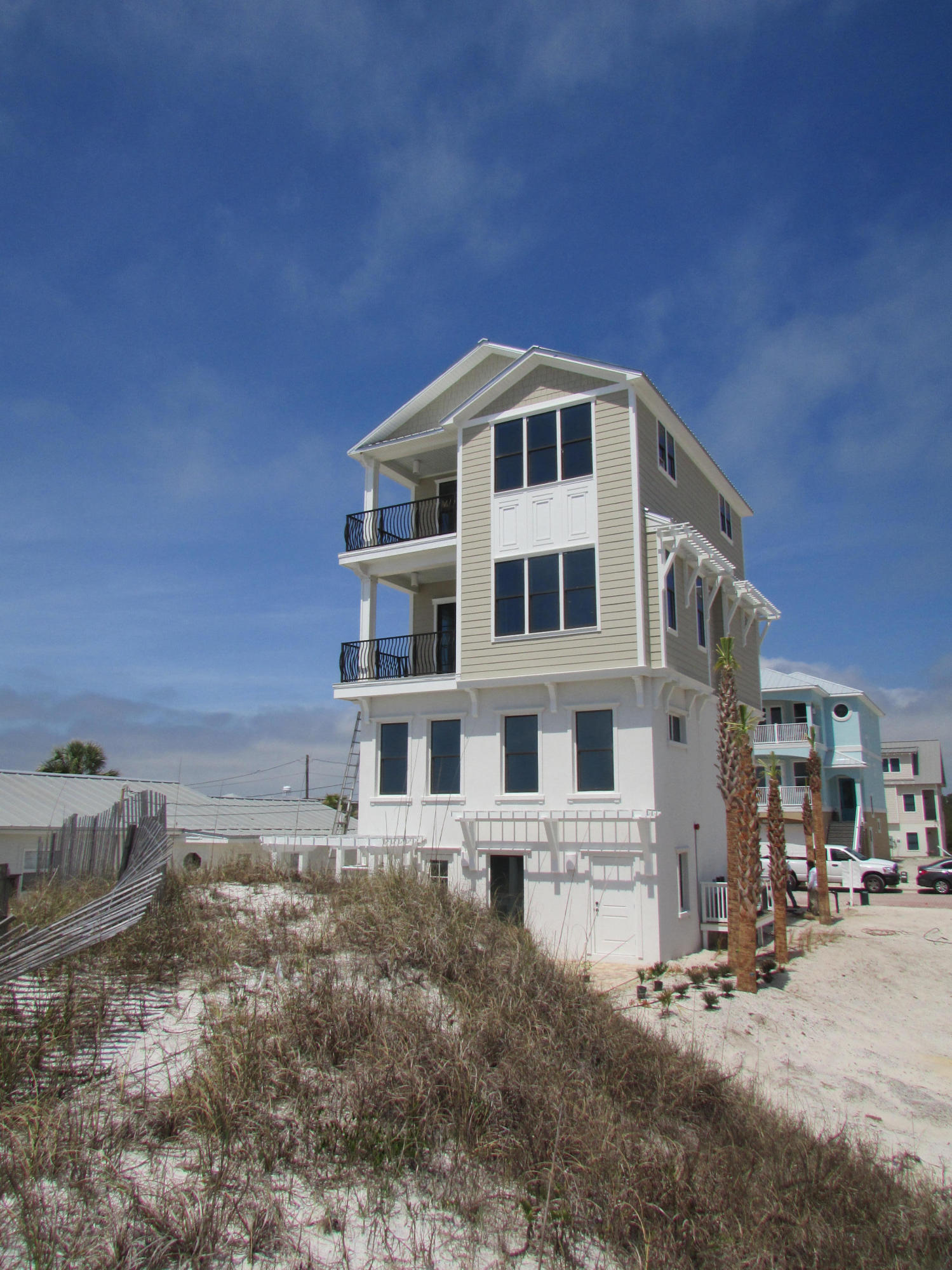 Beautiful new construction located in quiet, tranquil Inlet Beach overlooking the amazing beaches and crystal blue water of the Gulf of Mexico. This gulf front house, designed by Tyler Doin and built by Suntec Construction, possesses the most amazing views and sunsets from all parts of the home. This home could be a permanent residence or an amazing vacation retreat. WIth four floors there is more than enough space to have your family spread out or to invite guests to enjoy the endless views. This property in INLET BEACH is in very close proximity to Rosemary Beach, the new shopping area of 30Avenue and Alys Beach. A mere 20 minutes to Panama City Airport. This spacious home consists of an elevator upon entry, a total of 5 bedrooms, 4 full bathrooms and half bath