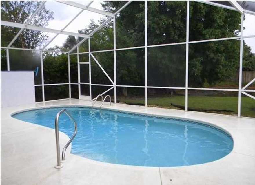 Just one look, and you will see why the pool/patio homes in The Glades are so popular. 3 bedrooms, 2 baths, 2 car garage, pool, close to the beach, shopping, golfing... This well-kept home is move-in ready. The kitchen was remodeled, and the floor plan is more open. Granite counter tops, white cabinets, a large snack bar & breakfast room are features of the kitchen. The huge great room/dining area has soaring vaulted ceilings and opens to the kitchen. Step outside to enjoy the beautiful covered patio & screen enclosed pool. The backyard is bordered by a pond filled with lily pads. The large master retreat also has vaulted ceilings & views to the pool & pond. The roof was replaced in 2006, the pool enclosure was recently re-screened. These homes sell quickly so make an appointment to view.