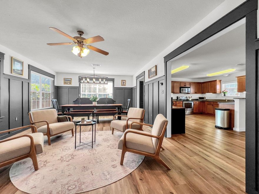 Be greeted by an elegant 2 story foyer as you enter the door! This immaculate home shows it's owner's eye for cleanliness, design, and home care. Built in 2005, it meets all the high standards of hurricane codes, energy efficiency and solid construction.  It boasts 5 bedrooms and 3 baths.The back yard invites you to enjoy the wildlife of birds and squirrels playing in the large oak trees by sitting on your screened in covered porch! Prepare for guests by lighting a fire in the modern fireplace and cooking in the immense kitchen designed with spiraling countertops of granite and storage for all those cooking gadgets that make food preparation a cinch! Located where everyone wants to be, this home offers it all in easy reach of Publix, Sacred Heart hospital, beaches, the bay, boat launches.