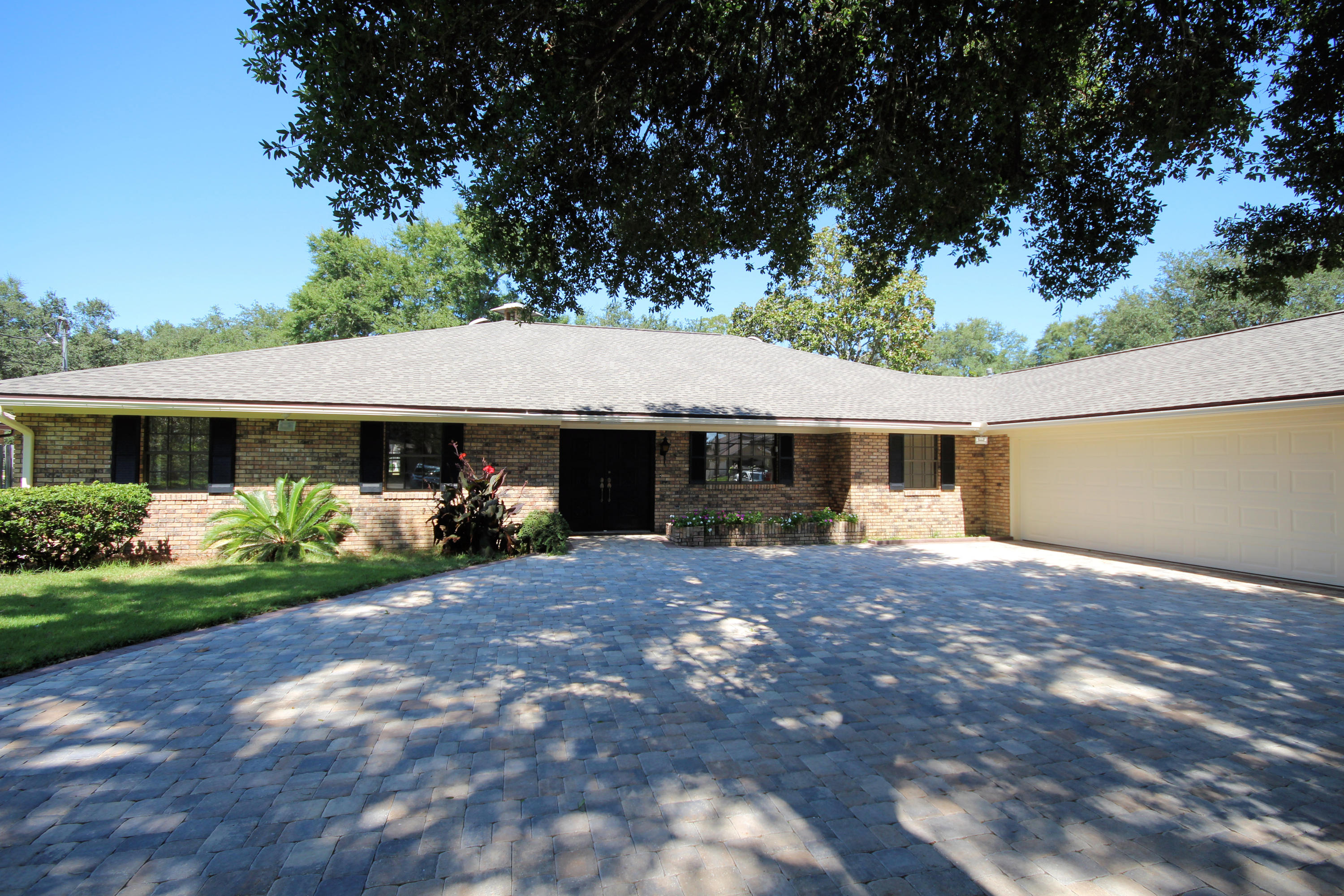 Updated and New price! A must see!! Golfers paradise! Tennis lovers delight! Join the Shalimar Pointe Golf Course and have ready access to the 1st tee, 9th green, 10th tee and 18th green via a 5 minute walk, or less, out the back yard or in your golf cart. Become a member of the Shalimar Pointe tennis club and enjoy 5 rubico courts with lights, for night play, all within one block.This is a one owner home and sellers have spared no expense in attention to detail of quality construction.A brand new dimensional shingle roof has been installed this month, August, with 30 year warranty, freshly painted interior is in progress now.Additionally there is a New A/C with a 10 year warranty, Solid Granite Kitchen Counters, Granite bathroom vanities and double ovens only 3 years old.