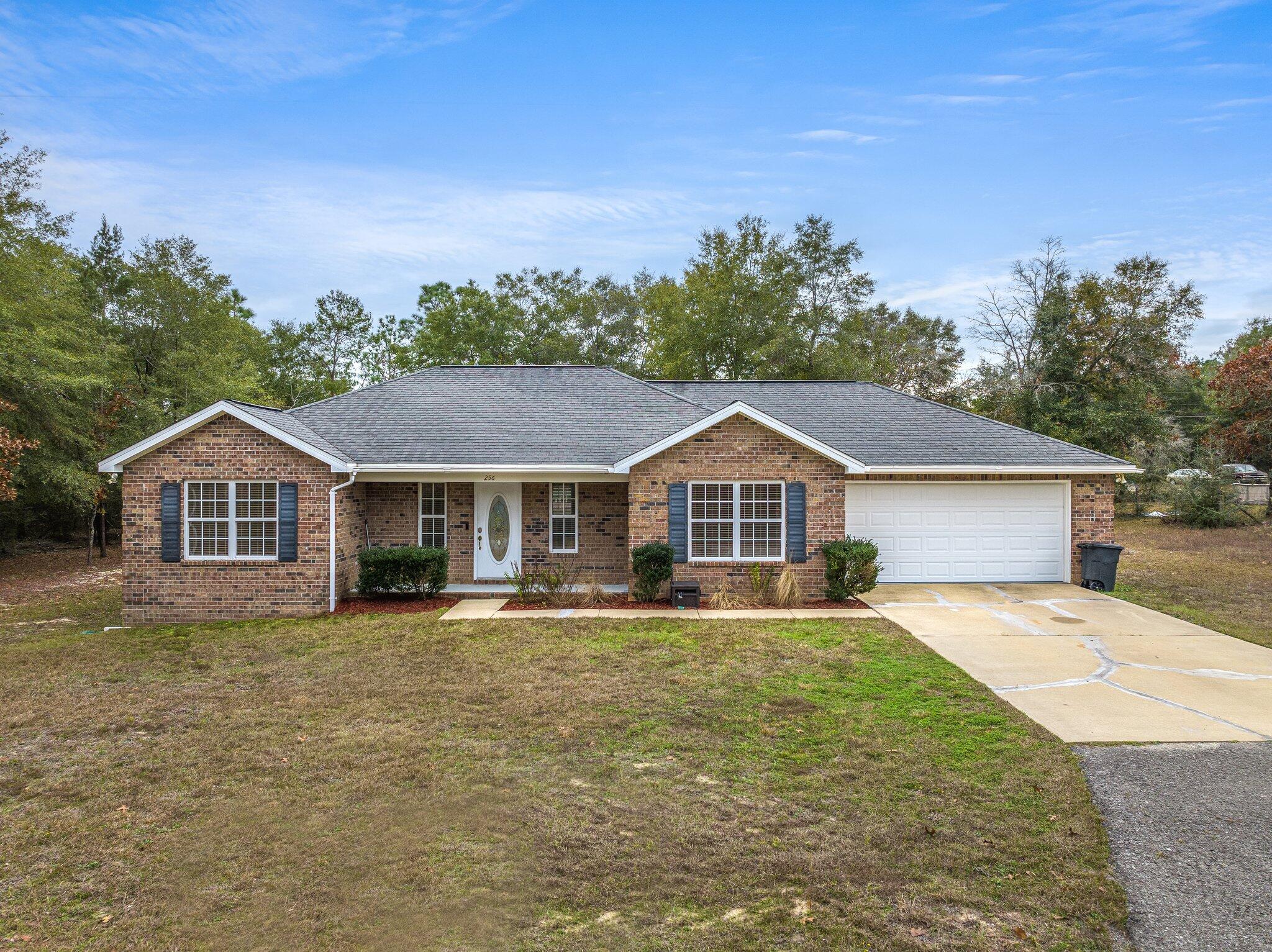 ***LooK*** This is not a typical quick build house. This is a well built ALL brick home on west end of Defuniak Springs. The cathedral ceiling in the living room makes for an even more spacious area that is open to the dining area. Master Bedroom features a tray ceiling and En suite bathroom. The two guest bedrooms have plenty of space for the little ones, teenagers, or guests. Home is better than new and has been meticulously cared for! Wiring and Plumbing are all up to code. Water Heater, HVAC 2022 and roof is waiting for you to pick out your shingles to be installed before closing with full price offer. Simply move in and make it your own.