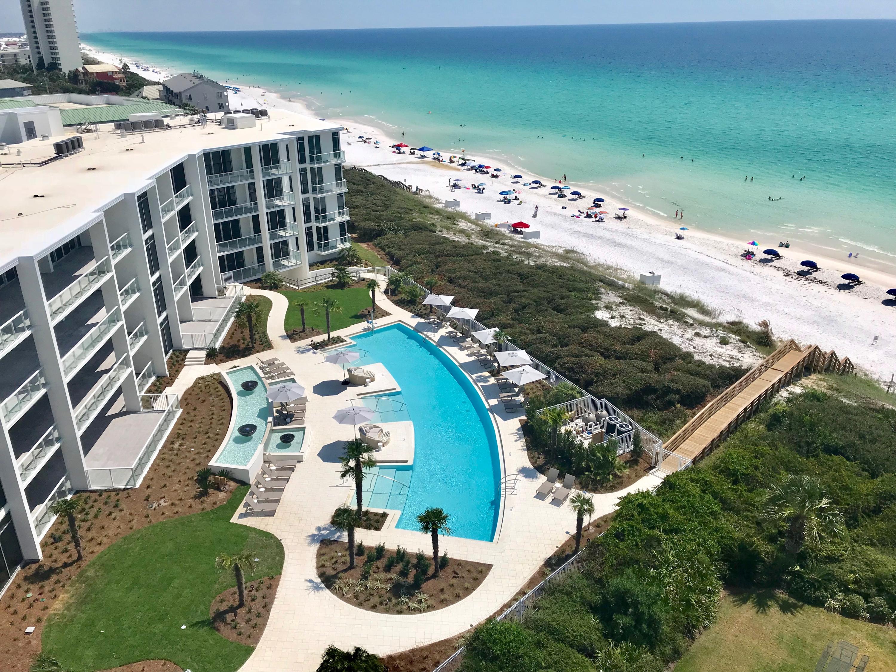 Come view this professionally decorated, fully furnished unit with expansive gulf views. Modern Luxury Perfected - Thirty One on 30A, an ultimate destination for owners who seek the pinnacle in architecture, design, comfort and foremost beachfront living. Located in Seagrove, the 3.92 acre property boasts over 335' of white sand beach frontage. Positioned 1.5 miles east of Seaside. Amenities include secure underground parking, a resort style pool and expansive pool deck, private owner's storage areas, golf carts provided for owner's use, luxuriously appointed lobby, fitness room, and kitchen. Step off your private elevator and you are greeted by a refined selection of organic materials utilized in an updated, modern way.