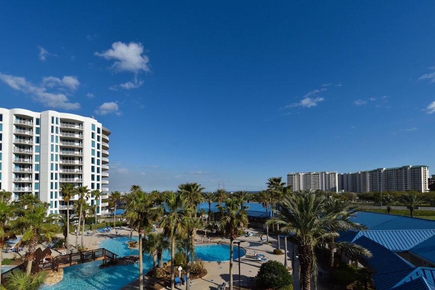 OUTSTANDING opportunity to own a beautiful fully furnished 3bed/2bath condo at The Palms. Don't miss out on this carefully designed open floor-plan with wonderful flow. The Palms has an onsite Coffee House, Restaurant, Tiki Bar, and night club. Enjoy State of the Art Gym and New Grill area, Pickle Ball, Indoor Pickle ball, Tennis Courts, Basketball. THE ASSOCIATION FEES INCLUDE ALL UTILITIES, INCLUDING ELECTRICITY.