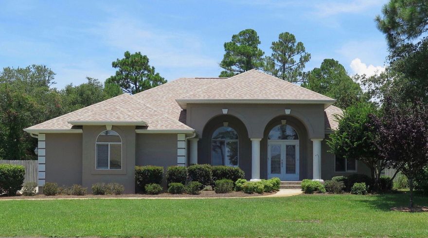 ACCEPTING BACK-UPS. Enjoy breezes and views of Intercoastal Waterway from the front porch, dining room and bedroom. Open floor plan house features: large rooms, newly renovated bath rooms, cathedral ceilings, transom windows, crown molding, granite countertops, fireplace and hardwood floors.Inside and outside recently painted. The large master bedroom has a tray ceiling and a large walk-in closet. Fish or kayak from nearby community deeded waterfront access, 50 yards away. Large fenced private backyard is bordered by woods and has a 12' double gated access for boat or RV. Watch a wide variety of birds from kitchen, dining nook or sunroom. Kitchen appliances purchased within last 5 years, new A/C. Large 15' x 11' walk-in shed. Under ground utilities, gas available to tap, public sewer