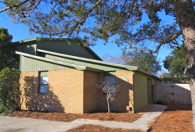 Freshly renovated townhouse in the heart of Destin. New siding, sliding door, paint is new in and out. All floors are tiled, master bath has custom walk in shower. Back yard is fenced and ready for pets and private outdoor living. This end unit has a larger yard than other units that can possibly be used for boat storage. Owner has invested much in bringing this unit up to current standards. The following list are some of the improvements. New front door, new front lights with photo cell, new flood light w/ motion sensor, new T1-11 hardee board siding, new sliding glass door w/ blinds, new window blinds, new door hardware and hinges, cabinets repainted with new pulls, new kitchen sink, new baseboard installed, new master water closet, new paint on most walls, doors and baseboards.