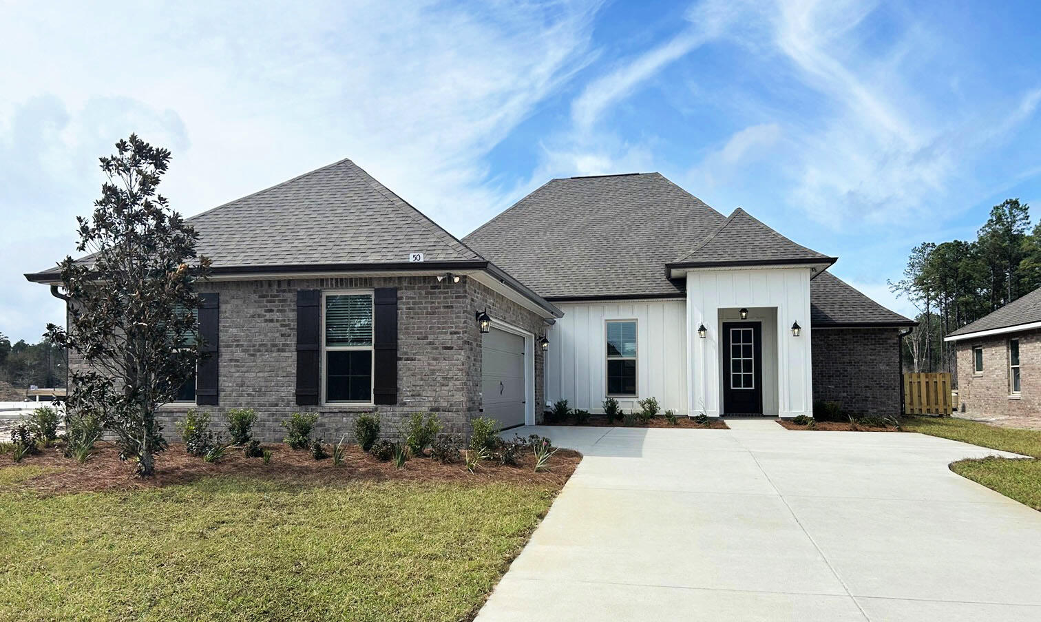Awesome builder rate plus FREE refrigerator. Restrictions apply.The CLAUDET III G in Starburst at Hammock Bay community offers a 4BR, 3BA open design with formal dining and keeping room. Upgrades added (list attached). Features: double vanity, garden tub, separate custom tiled shower, and 2 walk-in closets in master bath, tray ceiling in master bed, kitchen island, walk-in pantry, covered porches, recessed lighting, crown molding, framed mirrors, smart connect Wi-Fi thermostat, smoke and carbon monoxide detectors, landscaping package, architectural 30-year shingles, flood lights, and more!Energy Efficient Features: water heater, electric kitchen appliance package and more! Energy Star Partner.