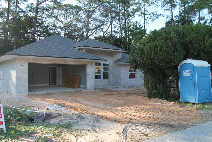 Picture is of a similar home. Brand new construction started on 9/21/2017. Awesome floor plan by multiple award winning builder and past Parade of Homes winner! This 4/2 custom brick home has super curb appeal. There are 10 ft. ceilings w/ impressive crown molding, tile flooring, and 5 1/4'' baseboard throughout the main living areas. As you approach the front of the home, you will be quite impressed. The covered porch is very welcoming, and the 8 ft. leaded glass door, makes for a grand entrance. The formal dining room is at the left of the home's front. You will then enter the chef's delight kitchen will which boast maple cabinetry, granite countertops, a huge pantry, a storage closet, and stainless appliances (including an oversized