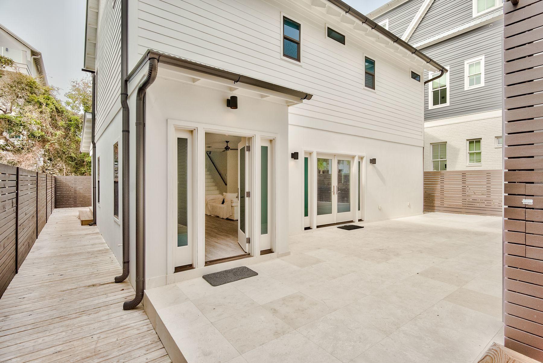 This home just 4 lots north of the beaches in Old Seagrove was completed in 2017. The new main home boasts clean lines and crisp finishes.The first level has an office or bunk room and a 1/2 bath along with the large kitchen and open living and dining space. High end appliances finish the detail.The second level has two luxury bedroom suites and the washer and dryer for the home is also found conveniently located for the bedrooms. The secondary cottage is a full living accommodation that was fully renovated in 2017 and 2018. It has completely new interior finish including a kitchen, dining and living on the first level along with a full bath and a loft king bedroom area with a 1/2 bath on the second level. Rented together or separately, the possible income exceeds $130,000