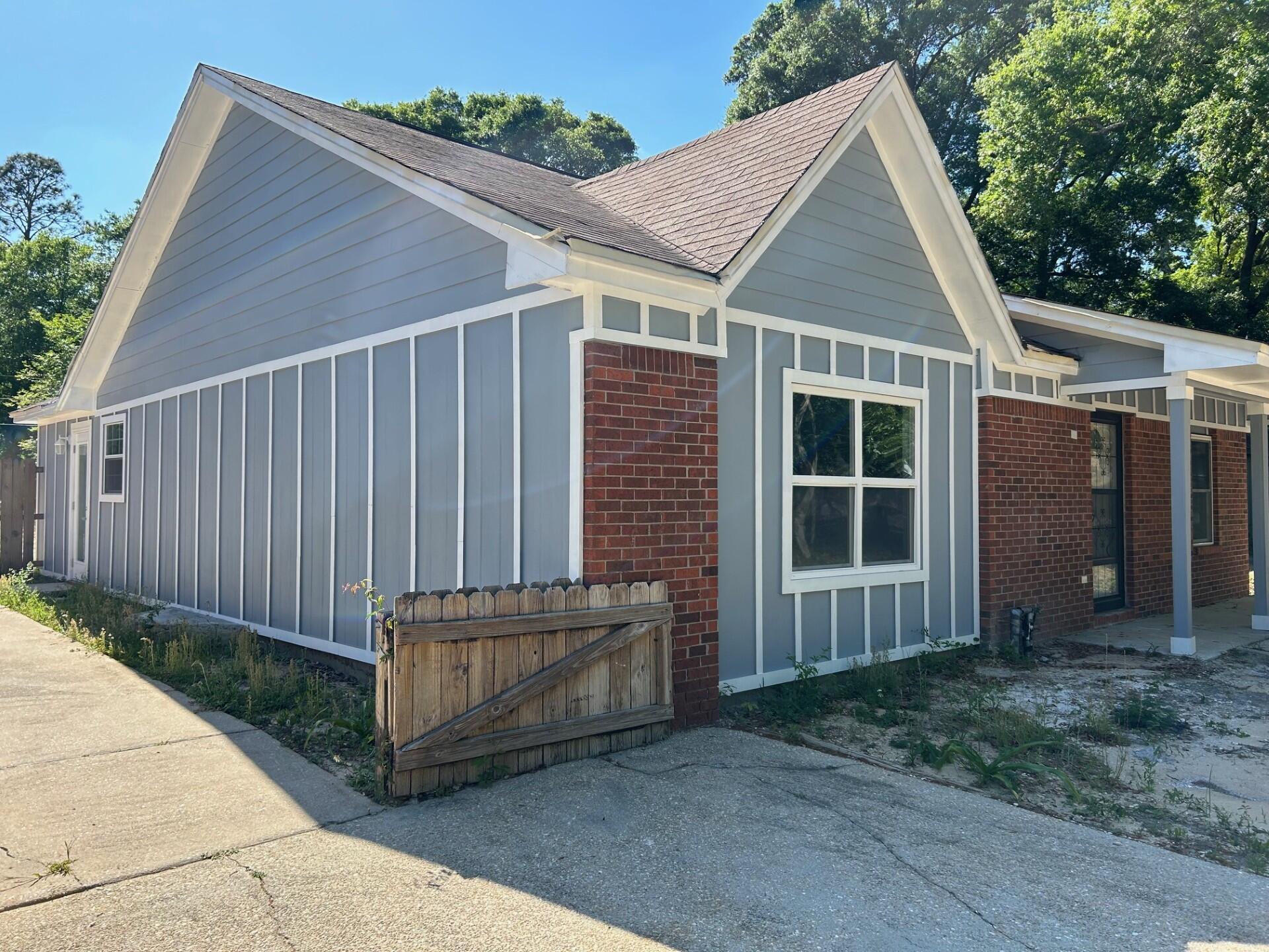 Location! Location! This beautiful 3 Bedroom 2 Bath Home has been completely remodeled, to include new Electrical, Plumbing, Windows, HVAC, Duct, Water Heater, Custom Flooring & Paint throughout, Stainless Appliances, Quartz Countertops in Kitchen & Bathrooms, New Roof Replacement is scheduled for July. Owner will be completing some needed landscape upon move in. Applications are online at rentcafe.com
