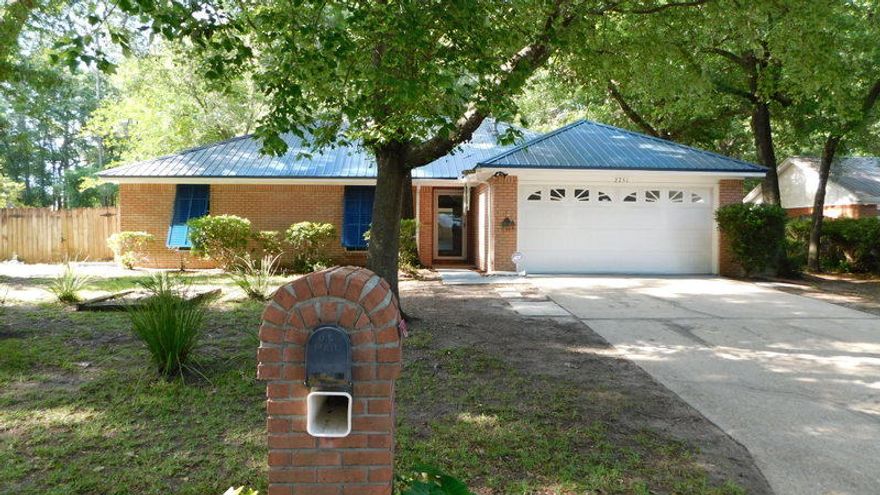 Wonderful and solid brick home with a metal roof located on a highly sought after Savannah Lane. Easy access on the very south end of Crestview and on  a tree shaded culdesac. The owners have installed brand new carpets in May 2021 for the buyers. There is a whole home generator, a screened in sunroom with new indoor/ outdoor carpet, a wood burning fireplace and vaulted ceiling in the great room. To find a home in this location and this price is very difficult. The home is ready for a quick closing and possession.  Come by and take a closer look and enjoy the tree lined street of Savannah lane, only 30 minutes to the bases, beaches and shopping along the Emerald coast.