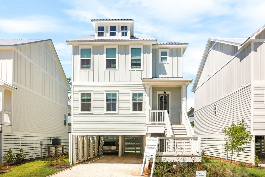 Assumable Mortgage at 5.6% - sold fully furnished! This 2023 waterfront home has amazing sunrise/sunset views on the bay! Across the street from the Cessna Boat Launch, there is plenty of parking space in the carport for multiple boats/jet skis, or up to 6 cars! This stunning home boasts 3 bedrooms, 2.5 bathrooms, and is perfectly located just 5 minutes from the beach while showcasing the serenity of bayfront life. Enjoy breathtaking bay views from the spacious living room, huge covered balcony, or expansive master suite! Sitting on a quarter acre lot with a massive backyard and open floorplan, you'll have plenty of space to both relax and entertain. Quartz countertops, LVP flooring, & extra large kitchen are just a few of the many luxury features of this incredible home!
